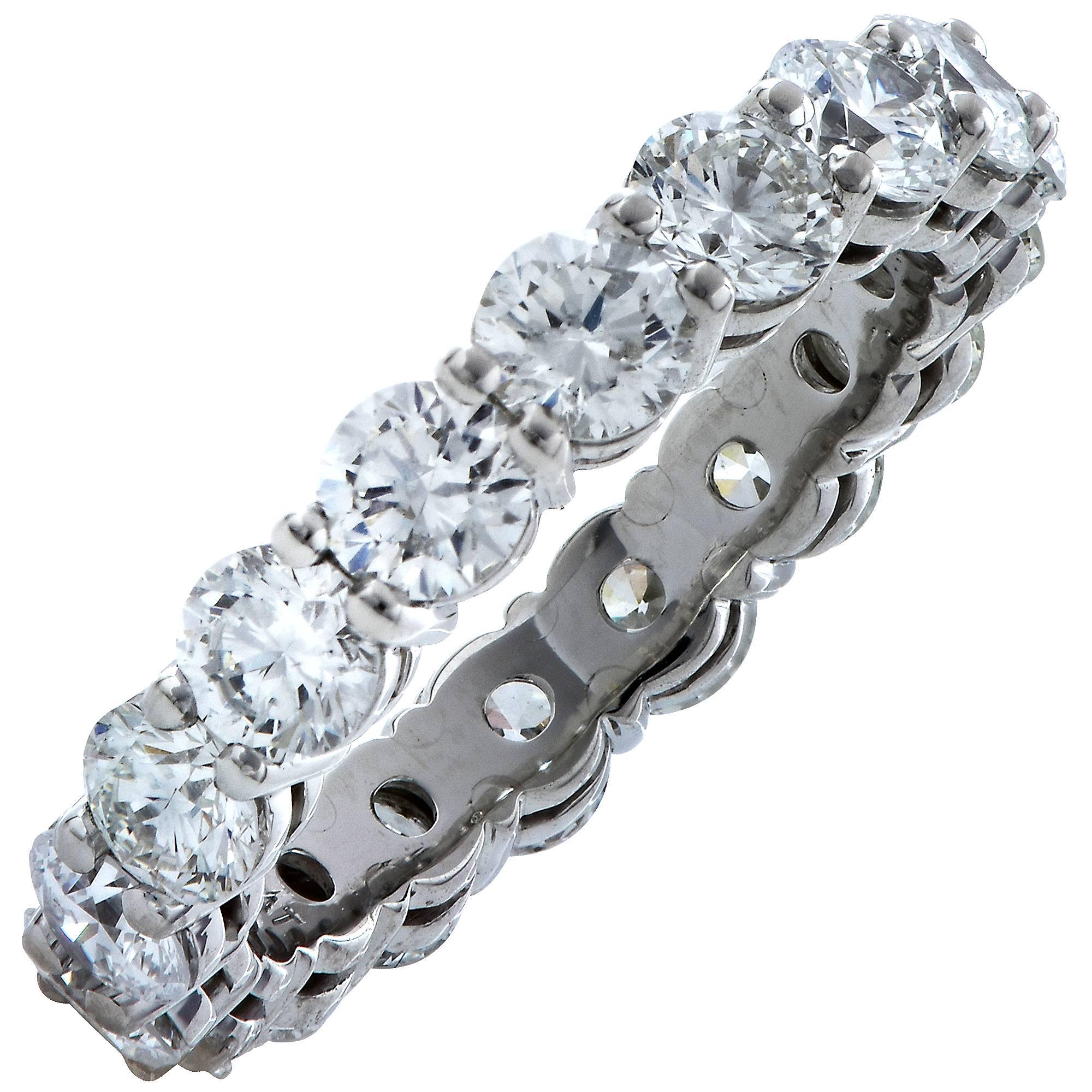 Platinum diamond eternity band featuring 18 round brilliant cut diamonds weighing 2.70cts F-G color and VS clarity.

The ring is a size 4.5 and cannot be sized up or down.
It is stamped and/or tested as platinum.
The metal weight is 4.19