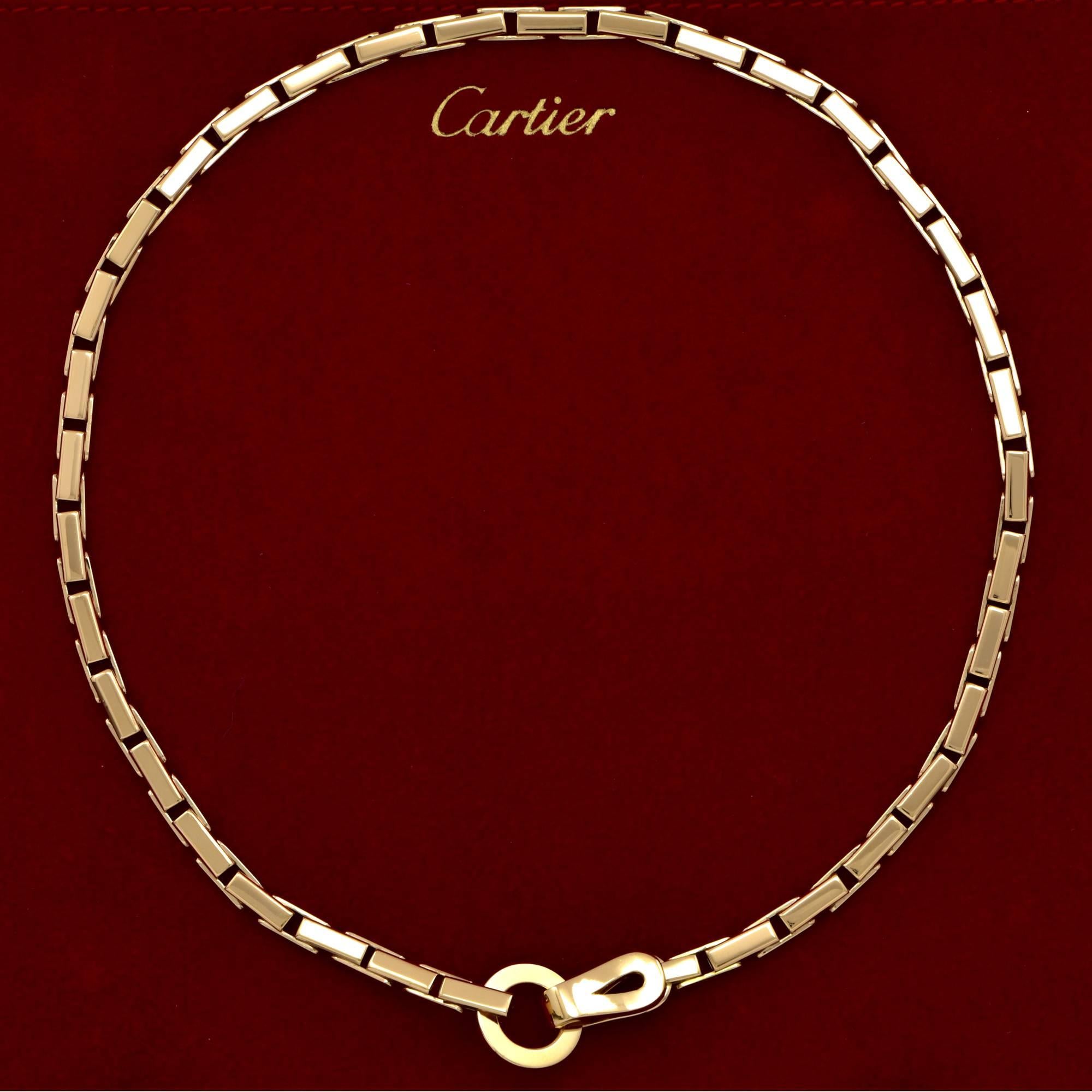 Glamorous 18k yellow gold authentic Cartier Agrafe necklace. A true testament to Cartier exemplary craftsmanship, this necklace features a simple yet elegant design, which can complement any outfit. Recently polished at Cartier, purchase comes with
