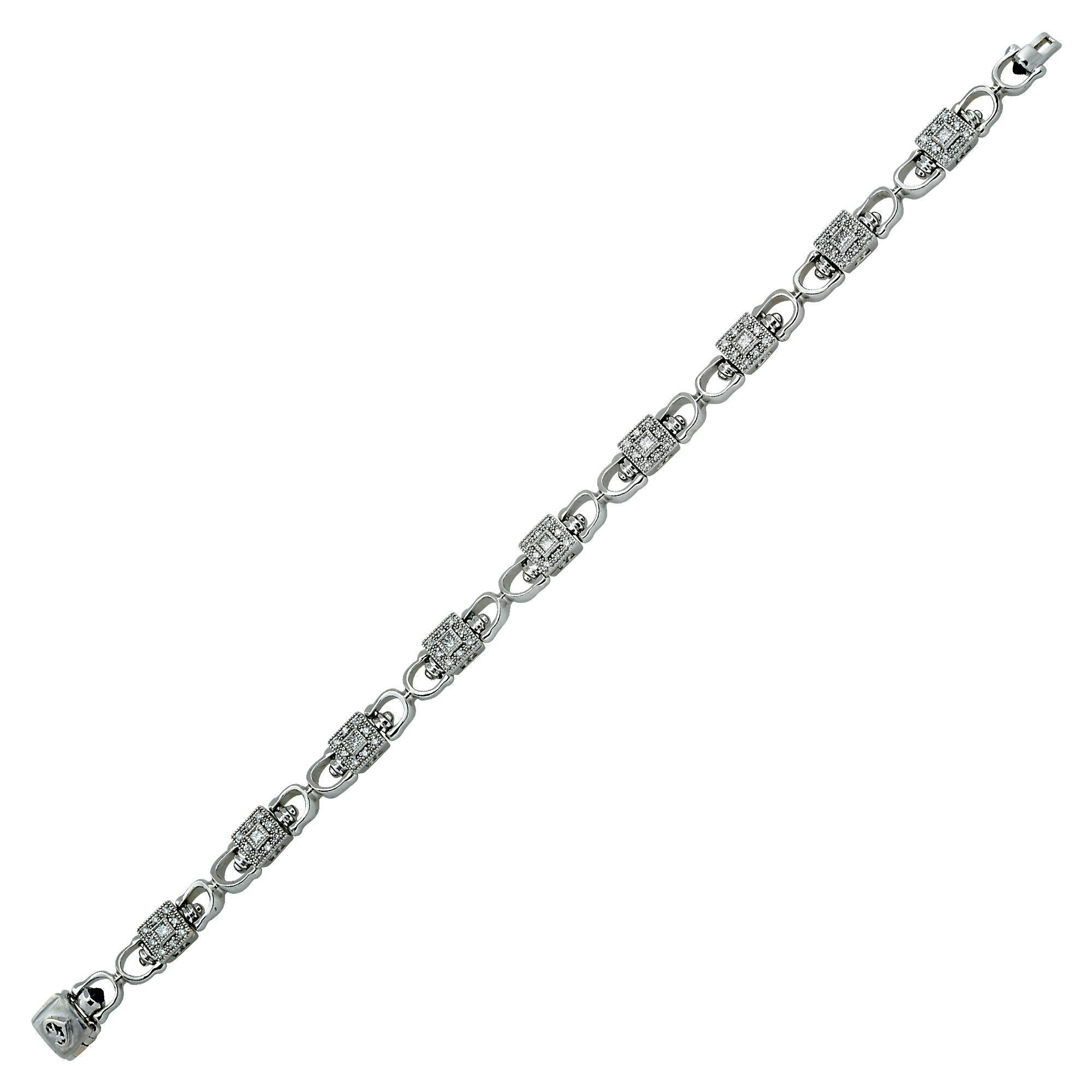 This beautiful diamond bracelet features 1.35cts of princess cut and round brilliant cut diamonds.

The bracelet measures 7 inches in length.
It is stamped and/or tested as 18k gold.
The metal weight is 21.45 grams.

This diamond bracelet is