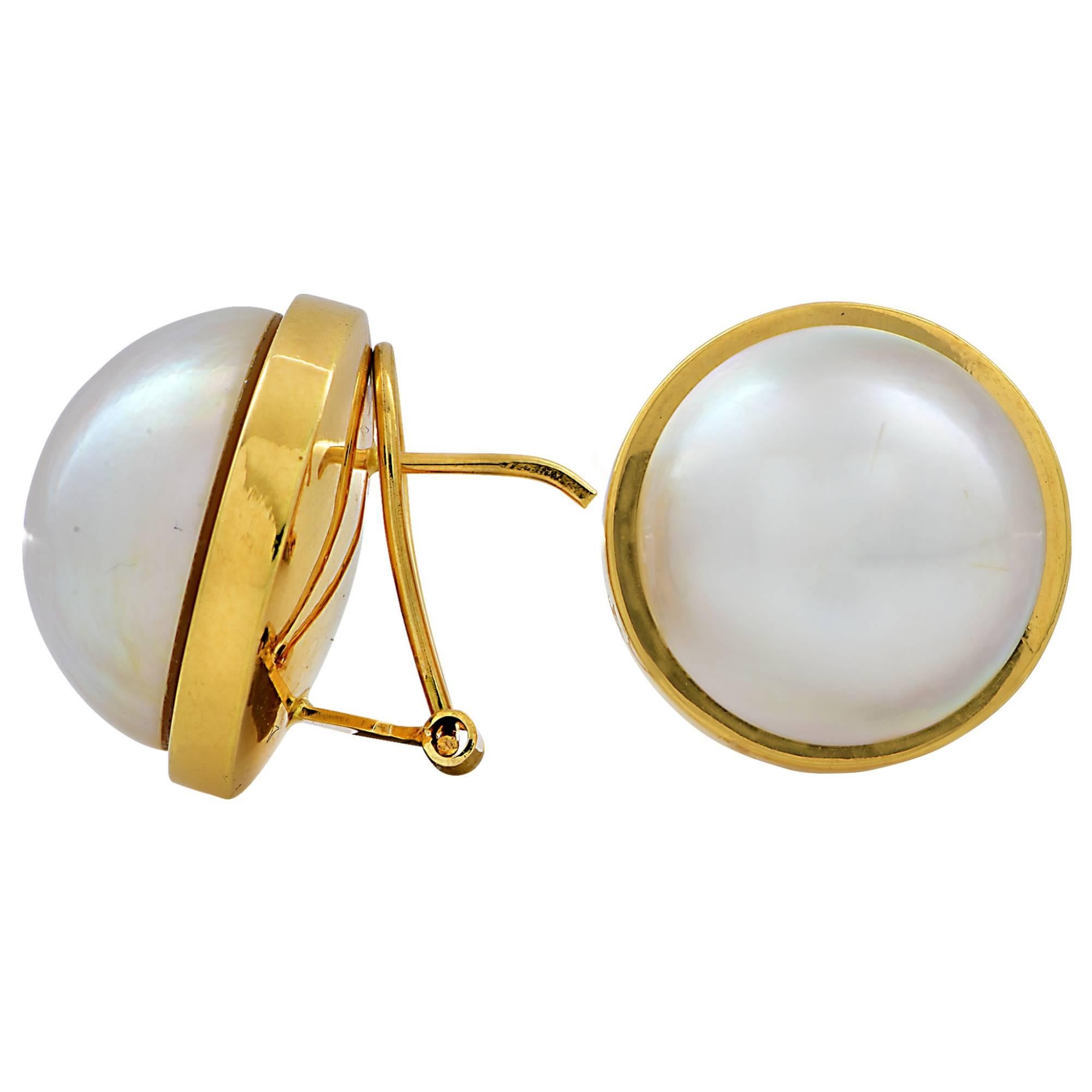 18k yellow gold earrings signed Riviera.

These earrings measure .78 inch in diameter.
It is stamped and/or tested as 18k gold.
The metal weight is 12.67 grams.

These pearl earrings are accompanied by a retail appraisal performed by a GIA Graduate