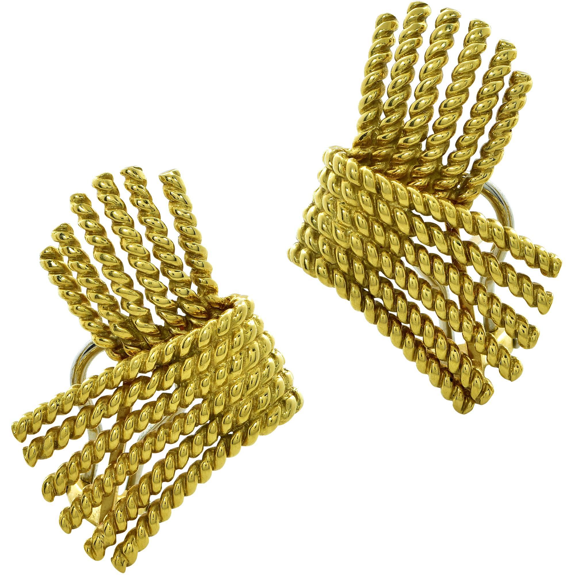 Tiffany & Co. Schlumberger V-Rope 18k yellow gold earrings featuring handcrafted wires of gold twisted together to form a rope design. These earrings measure 29.8mm x 21mm and weigh 16.64 grams. Since 1956 Jean Schlumberger has collaborated with