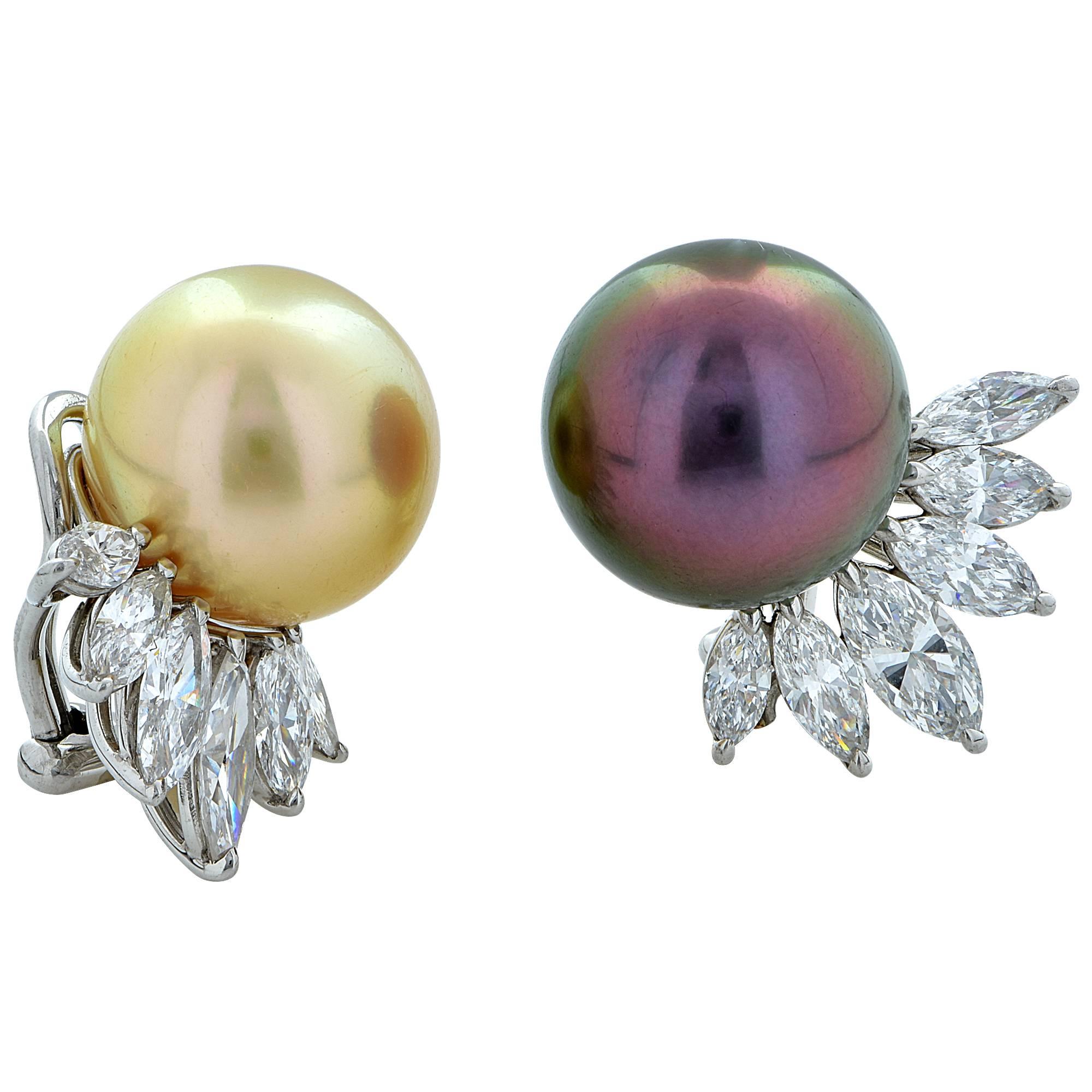Stunning platinum handmade diamond and pearl earrings featuring a Tahitian pearl and a yellow pearl measuring 14.6mm. Dangling from the pearls are 12 marquise cut diamonds weighing approximately 4.50cts total, G color, VS1-2 clarity. These