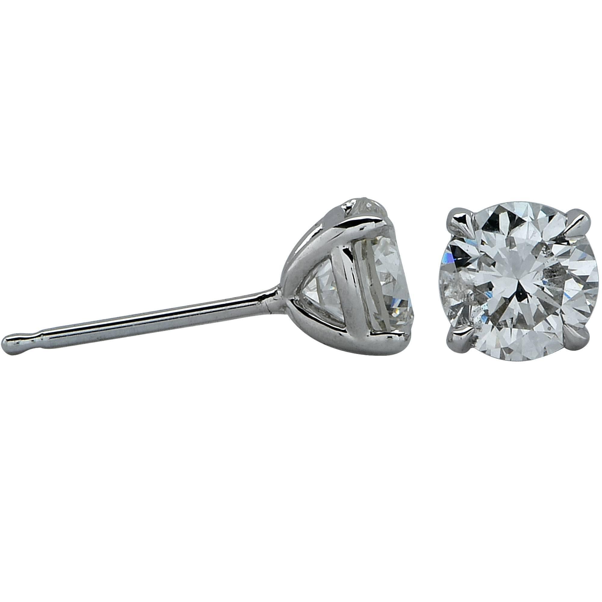 18k white gold 1 carat total weight diamond solitaire stud earrings featuring a matching .53ct round brilliant cut diamond H color and SI in clarity and .47ct round brilliant cut diamond H color and SI in clarity.

Measurements are available upon