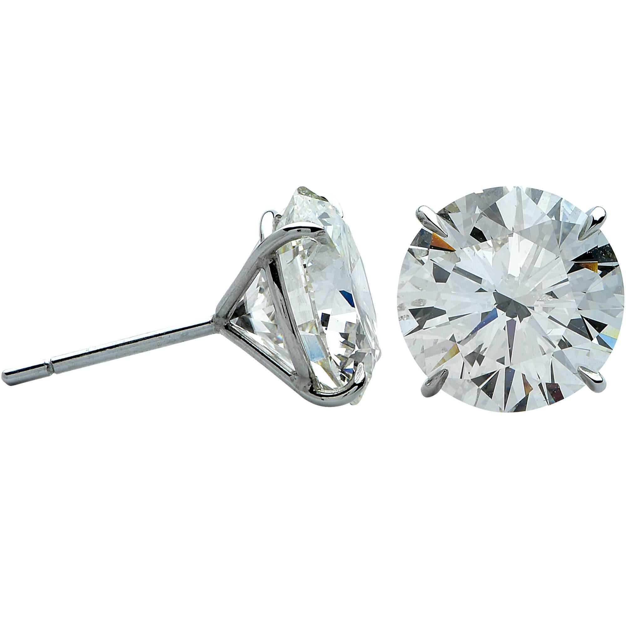 Vivid Diamonds & Jewelry created this handmade platinum solitaire stud earring set which feature 2 GIA graded round brilliant cut diamonds weighing 9.81cts total, K color, SI1-SI2 clarity. These stunning solitaire earrings are sure to be a show
