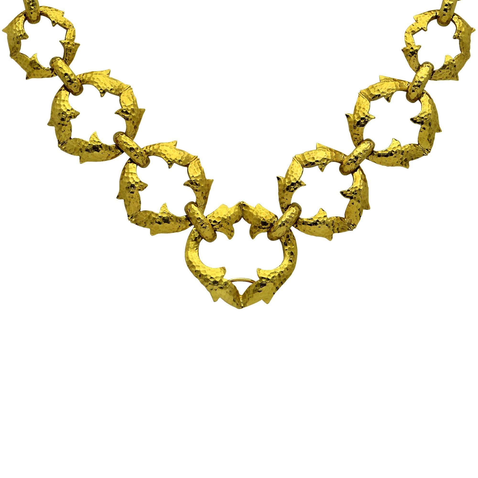 David Webb 18k yellow hammered gold necklace, designed in a flowing leafy motif. Measuring 28 inches in length and weighing 195.85 grams. This spectacular necklace can also be taken apart and worn as a bracelet. The set is accompanied by a document