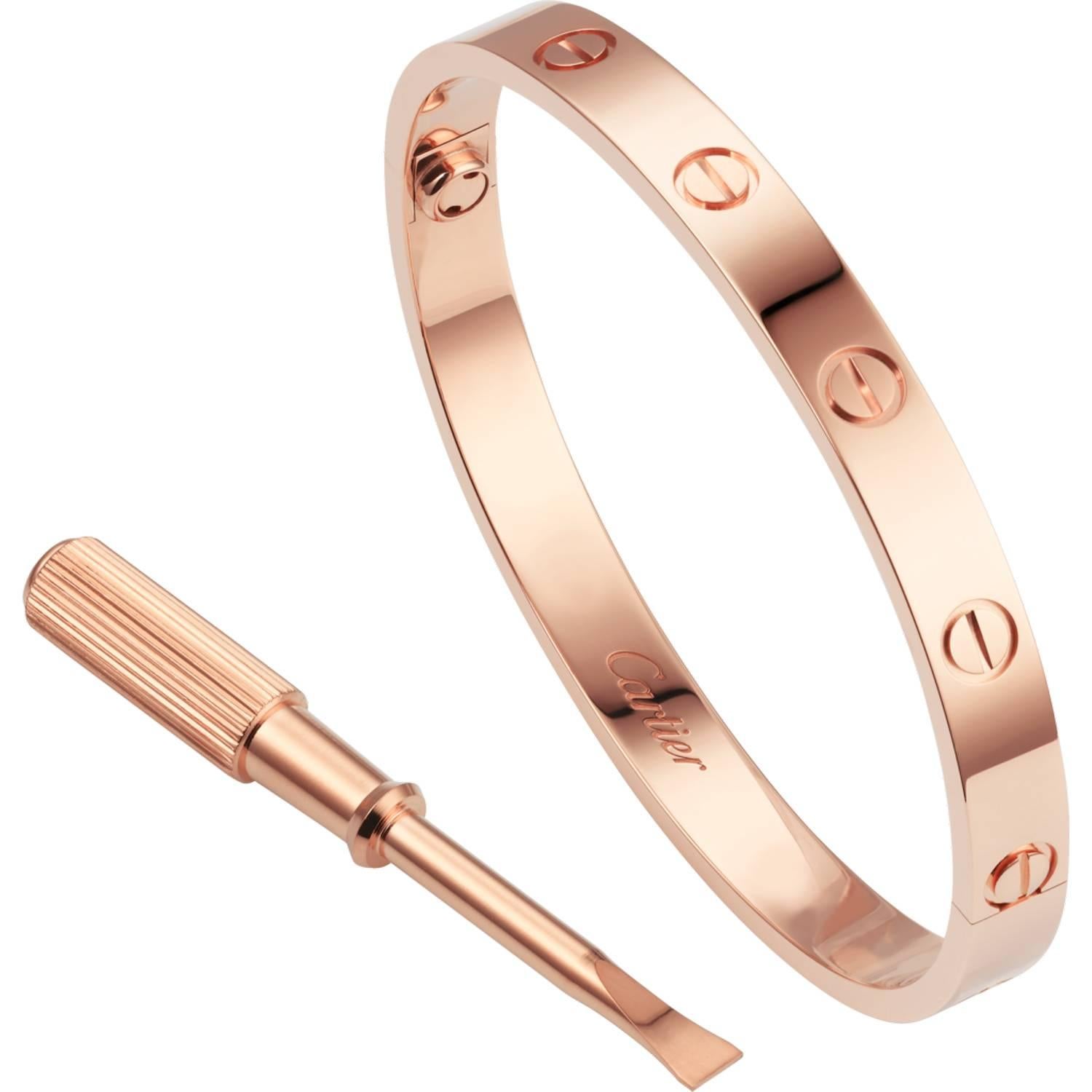Beautiful 18k rose gold authentic Cartier love bangle, size 17, in like new condition. This bangle has the new screw system and accompanied with the original box and authentication paperwork. The Cartier love collection has created a timeless