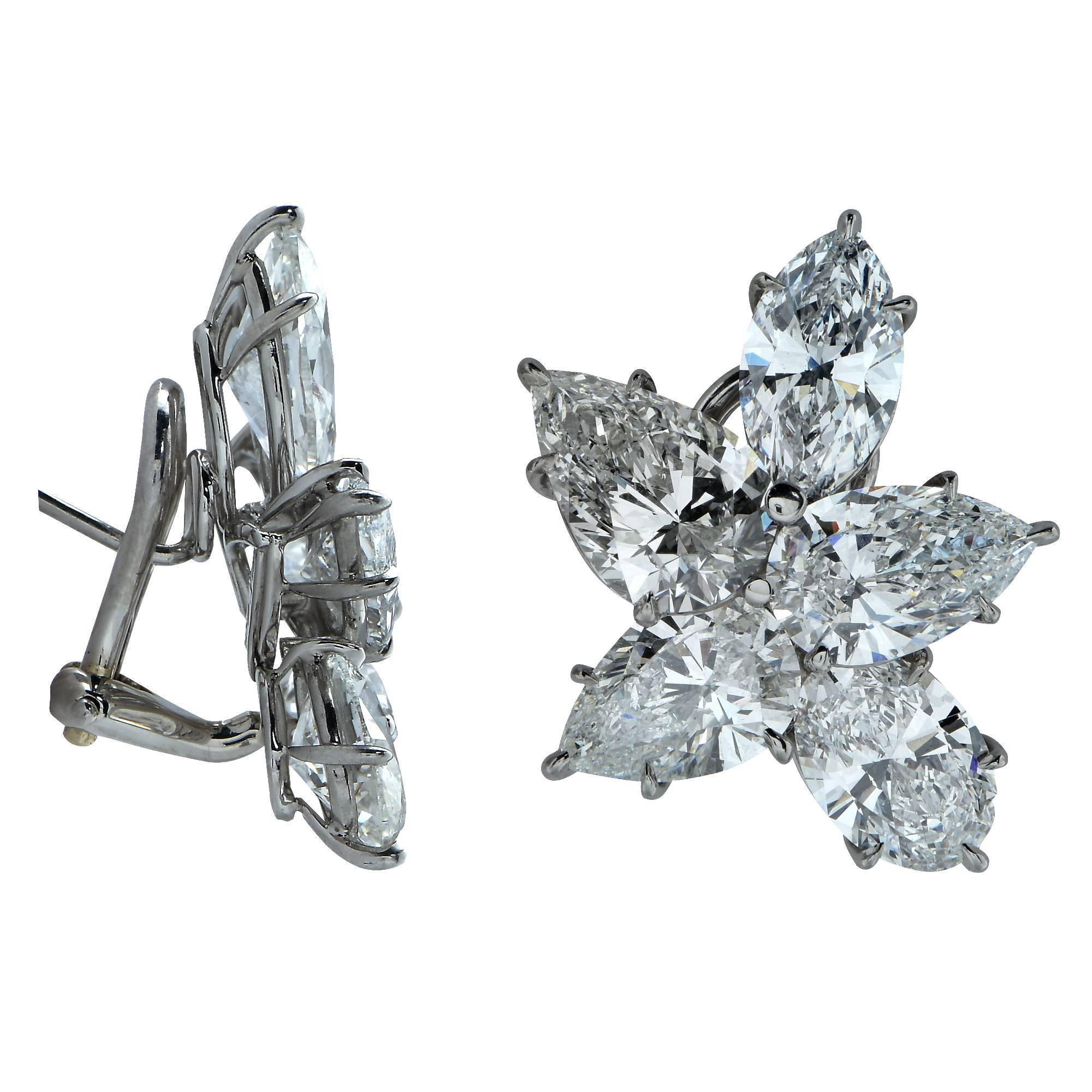 These handmade flower platinum earrings feature 10 sparkling marquise and pear shape diamonds weighing approximately 12cts total, D-E color, VS-SI clarity.

Measurements are available upon request.
It is stamped and/or tested as 18k platinum.
The