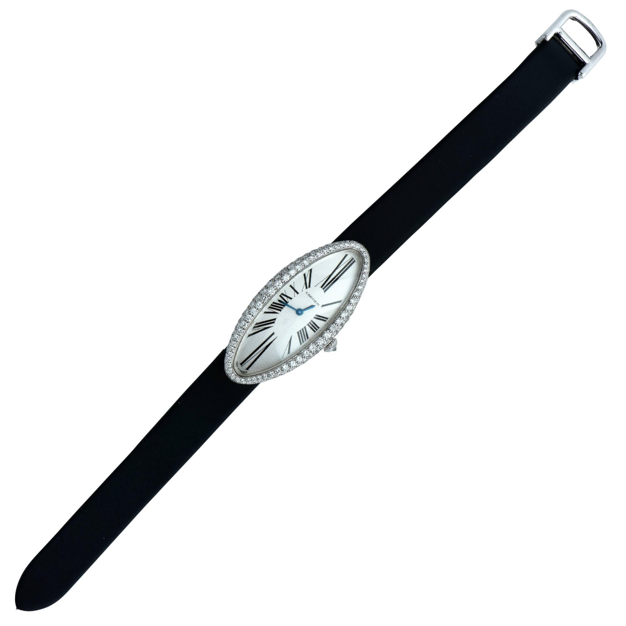 18k white gold ladies Cartier ladies wristwatch with an elongated diamond-set case. From the elegant Baignoire Allongee collection, this watch is sleek and elegant and is the perfect accent to any outfit. Cartier model number 2514. Cal. 060 MC