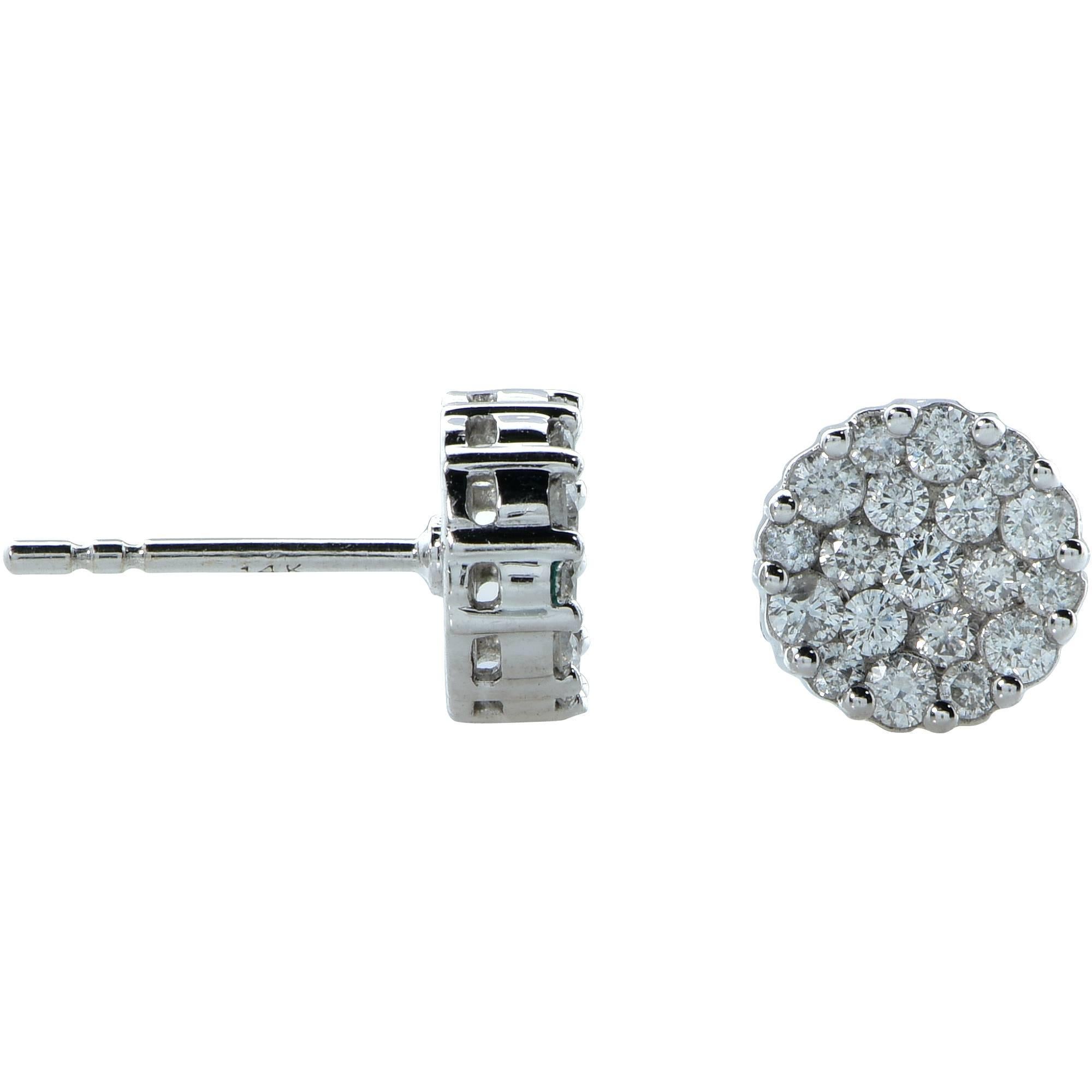14k white gold cluster earrings containing 38 round brilliant cut diamonds weighing approximately .75ct total G-H color and SI1-I1 clarity.

These earrings measure 8.20mm in diameter.
It is stamped and/or tested as 14k gold.
The metal weight is 2.02