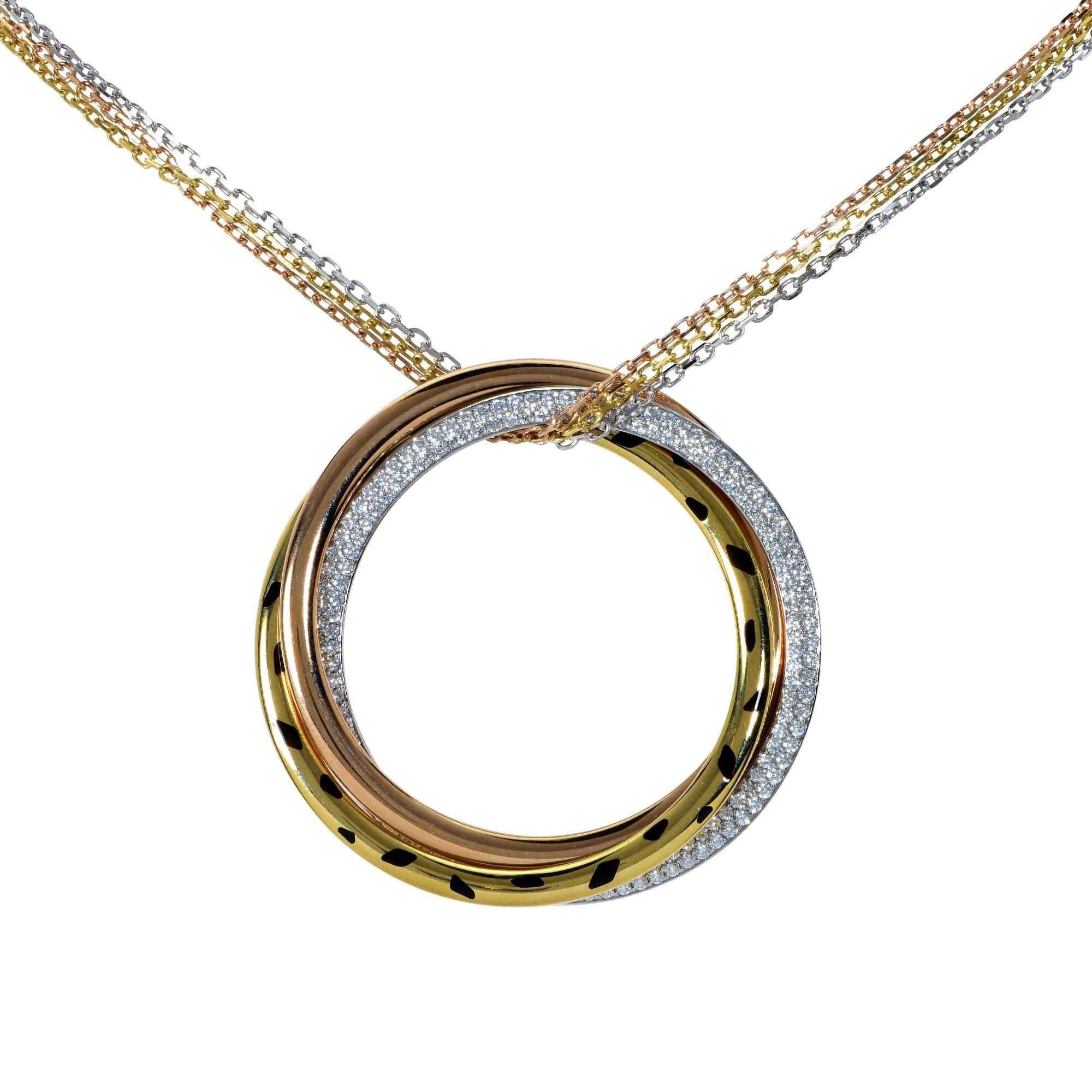 18k white, yellow and pink gold Cartier necklace from the trinity collection featuring interlocking tricolor rings embellished with black lacquer accented with 178 round brilliant cut diamonds totaling .88cts total F Color, VVS VS Clarity.  The