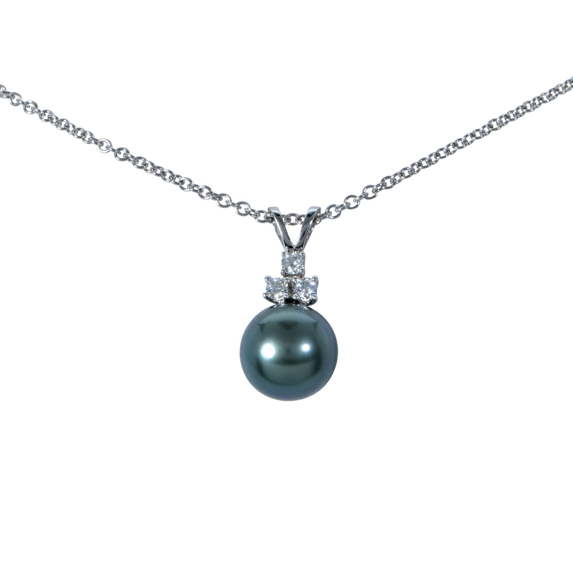 14k white gold pendant featuring a 10mm Tahitian pearl accented by 3 round brilliant cut weighing .20cts total, G color VS clarity.

Measurements are available upon request.
It is stamped and/or tested as 14k gold.
The metal weight is 3.26