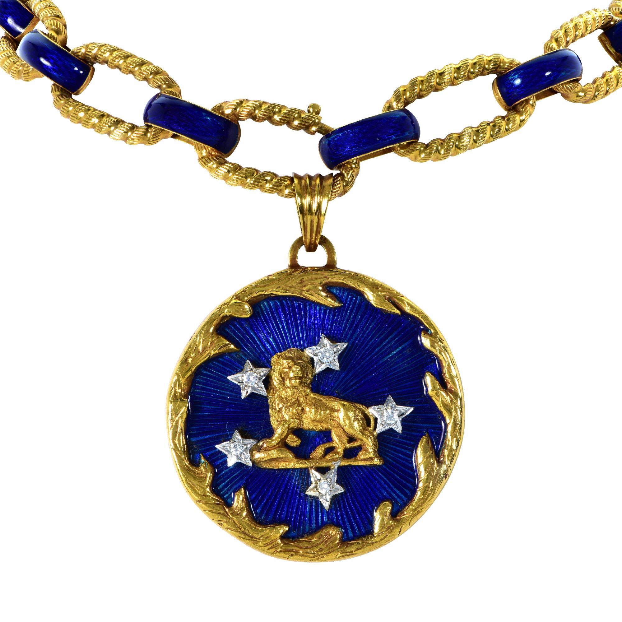 18k yellow gold necklace enhanced with vibrant blue enamel and adorned with an amulet featuring a gold lion. This necklace is transformable in to a necklace and bracelet suite.

The pendant measures 2 inches in diameter and the bracelet measures 8