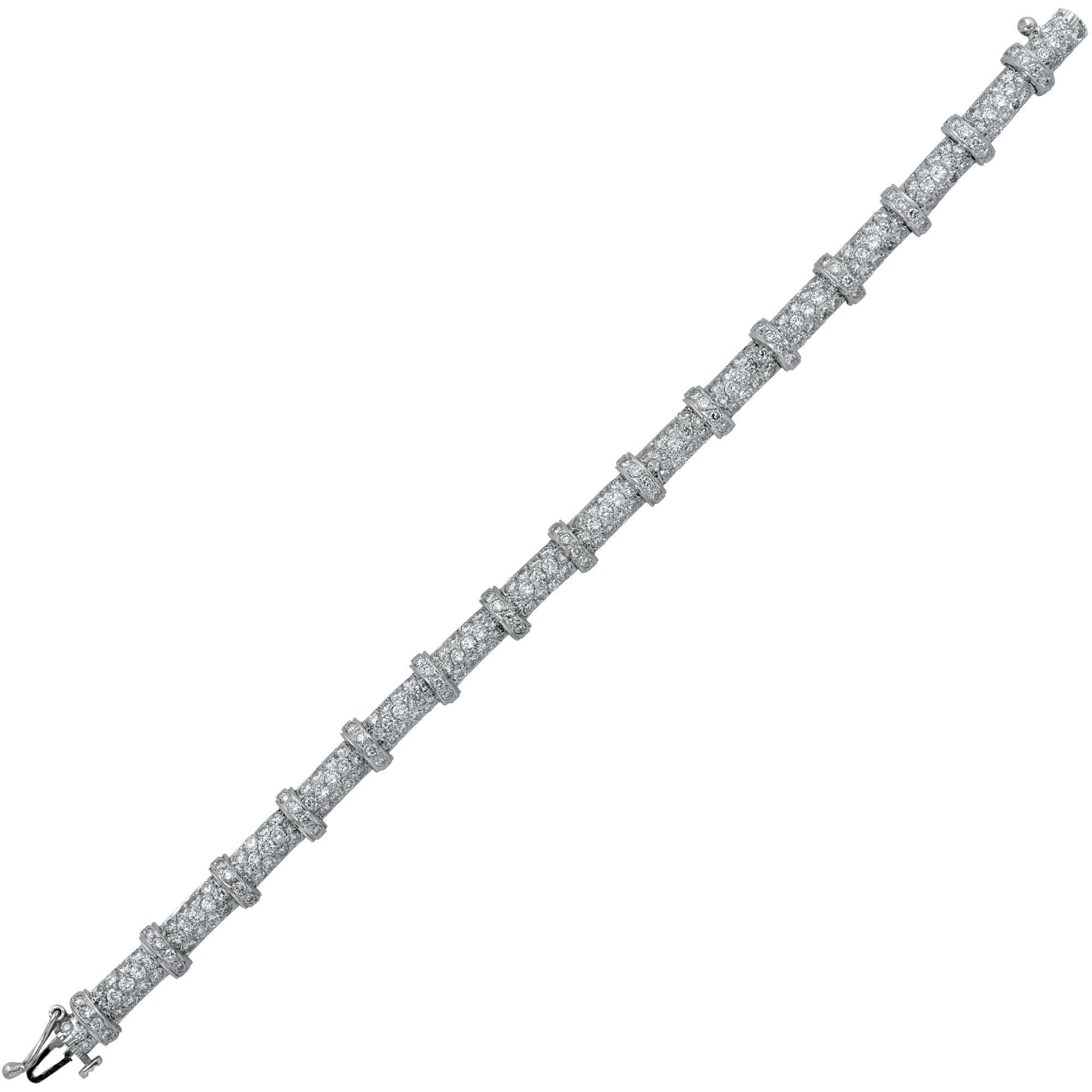 Ladies platinum bracelet containing 254 round brilliant cut diamonds weighing approximately 10.75cts G-H color and VS clarity.

This bracelet measures 7.25 inches in length and .30 of an inch at its widest point.
It is stamped and/or tested as