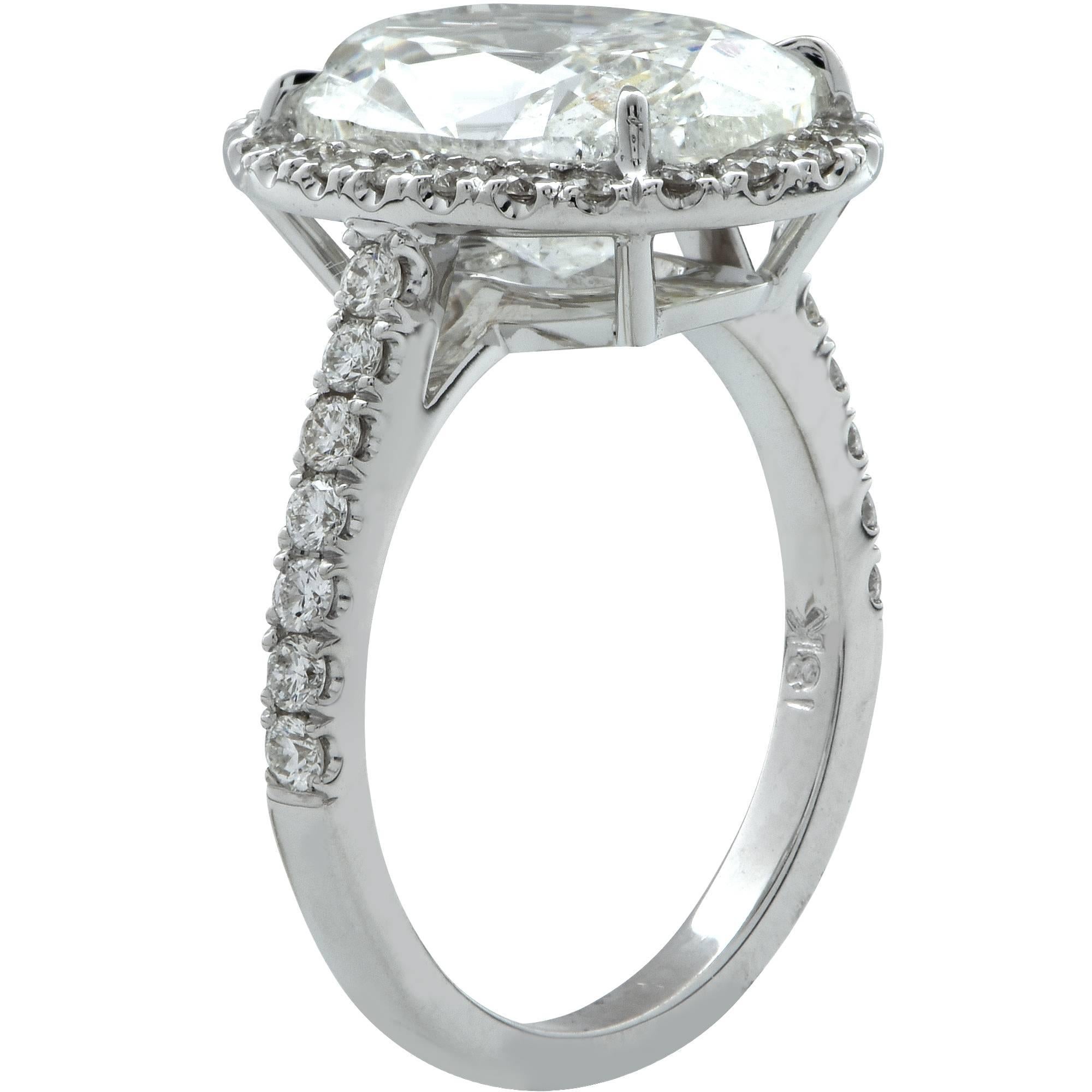 Modern 5.02 Carat Oval Cut Diamond Halo Engagement Ring