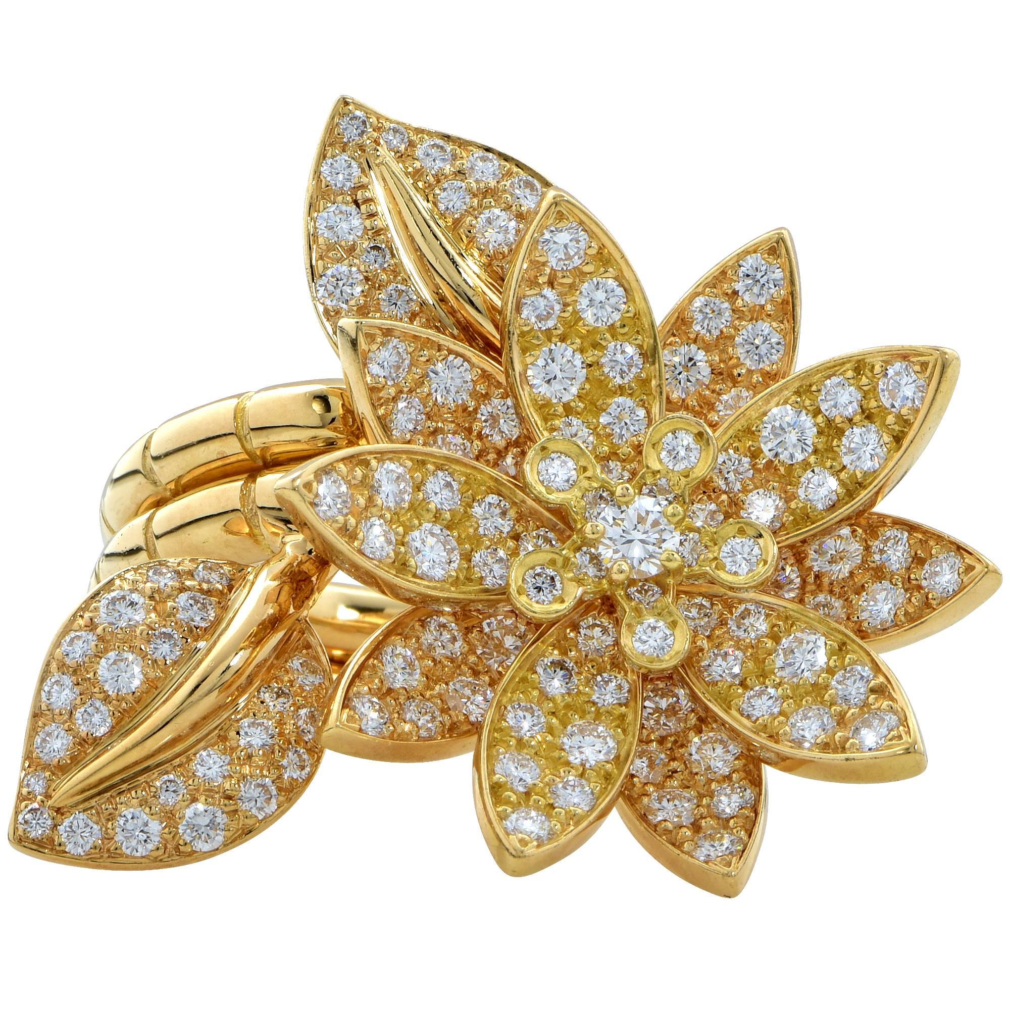 Van Cleef & Arpels Lotus between the fingers ring hand crafted 18k yellow gold containing 127 round brilliant cut diamonds weighing 2.13cts D- F color and IF-VVS2 clarity. European size 52, US size 6. The current retail is $43,500 USD.  A truly