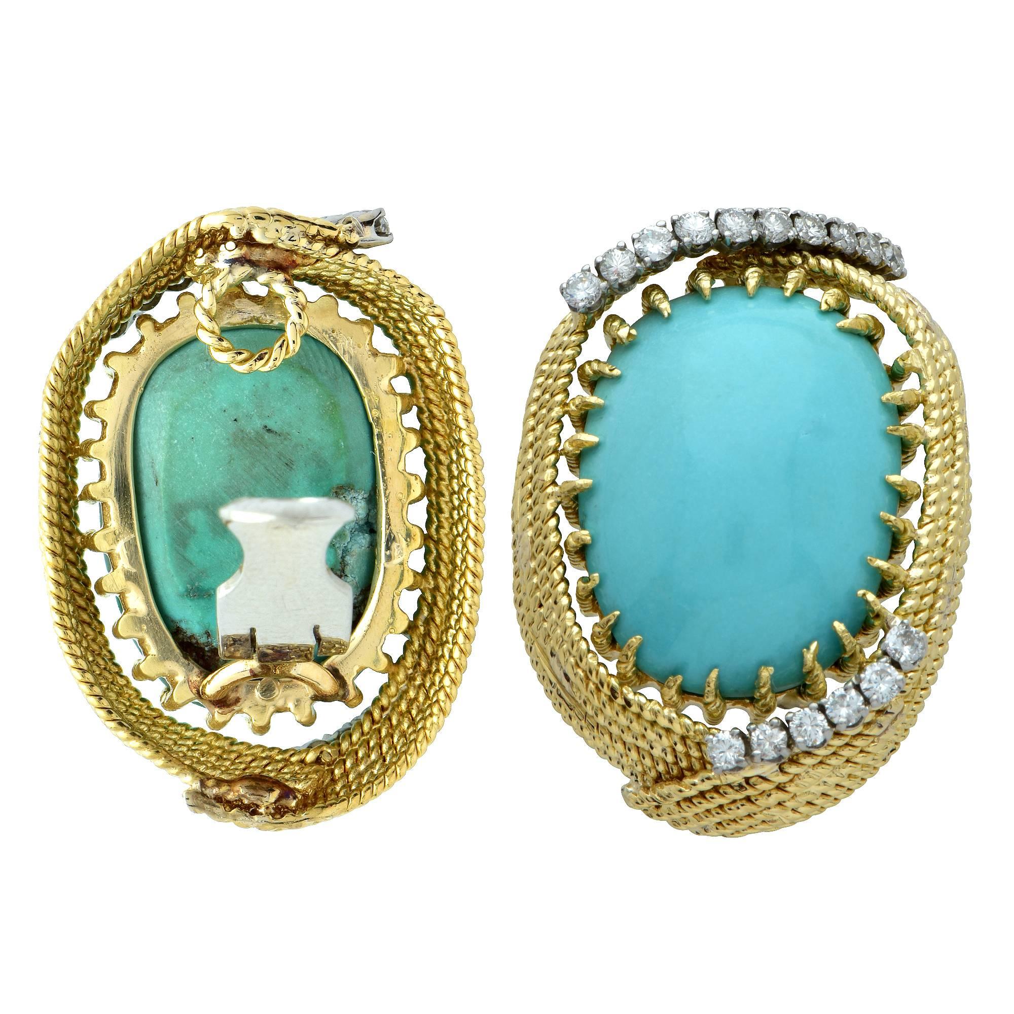Turquoise cabochons set in 18k white gold accented by 32 round brilliant cut diamonds weighing approximately 1ct total G color VS clarity.

Measurements are available upon request.
It is stamped and/or tested as 18k gold.
The metal weight is 33.89