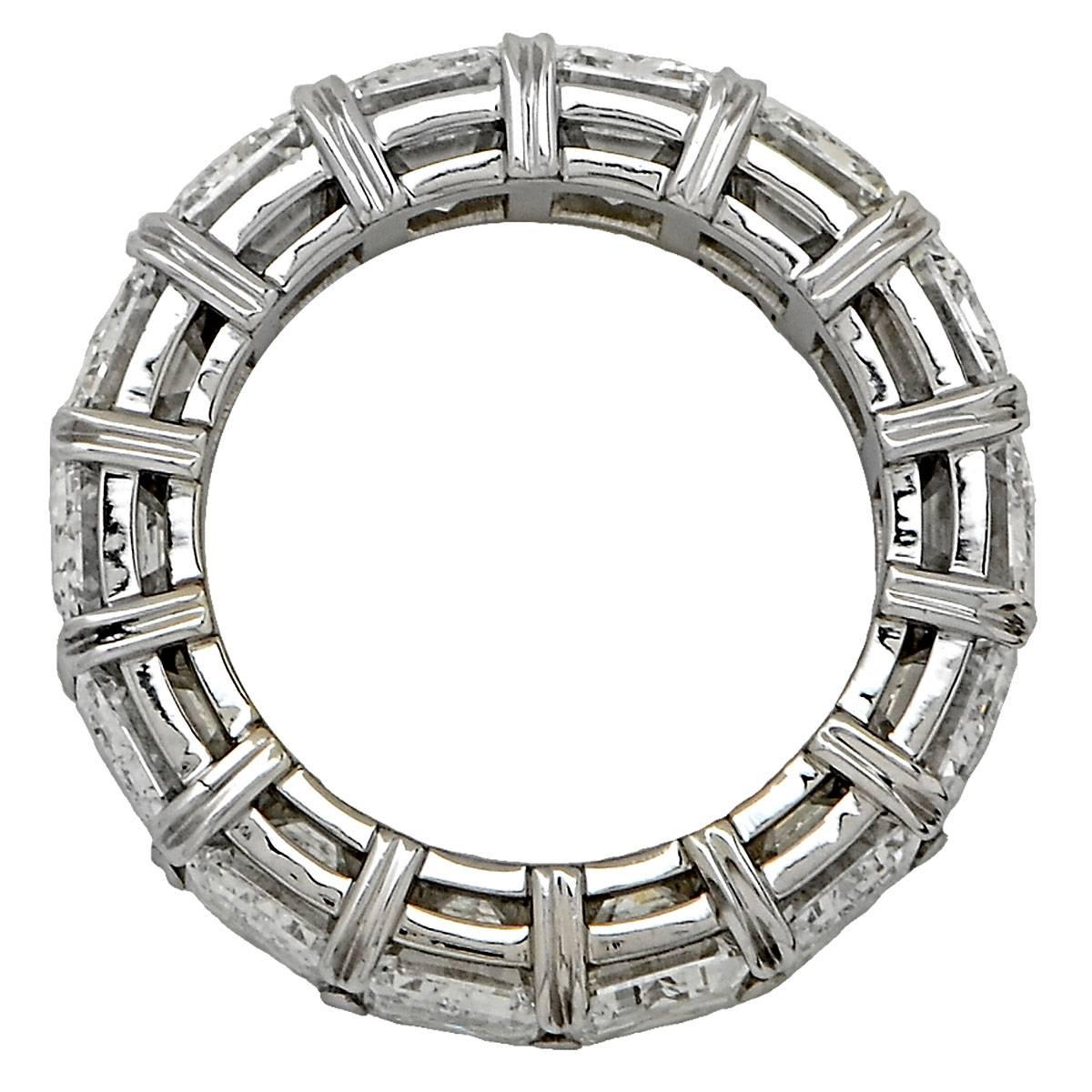 This stunning handmade platinum eternity band features 14 emerald cut diamonds each individually graded by the GIA (Gemological Institute of America) to be G to H in color and internally flawless to VVS2 in clarity.

The ring is a size 5.75.
It is