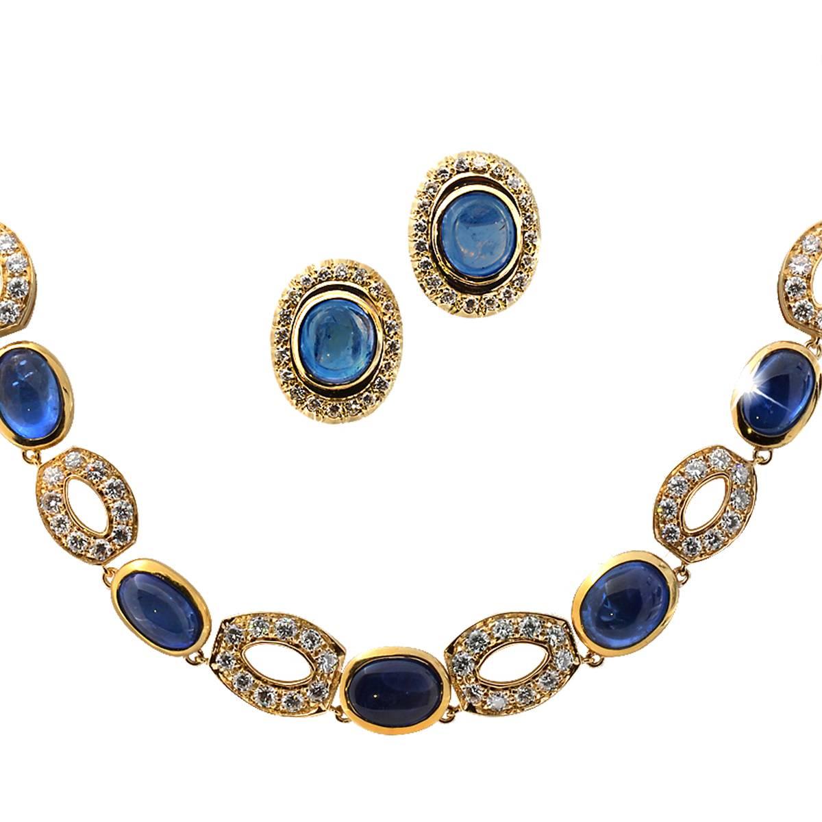 Sapphire Diamond Necklace and Earring Set with 11 Oval Cut Sapphires Weighing Approximately 37cts and 124 Round Brilliant Cut Diamonds Weighing Approximately 6cts.