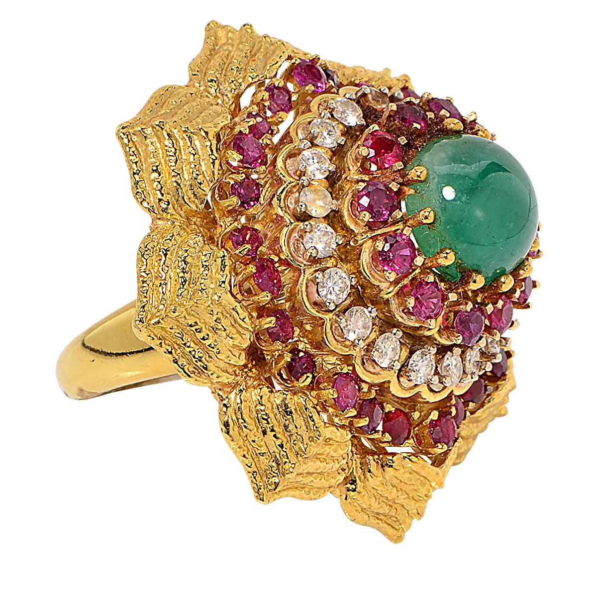 18 Karat Yellow Gold Vintage Ring Featuring an Emerald Cabochon, Rubies and 20 Round Brilliant Cut Diamonds Weighing Approximately 1.60cts, G Color, VS Clarity. Ring Size 7.