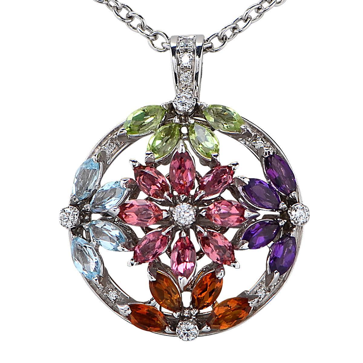 Asprey 18 Karat White Gold Necklace Featuring 24 Marquise Cut Citrine, Peridot, Blue Topaz, Amethyst and Pink Tourmaline Weighing 1.20cts Total Accented by 20 Round Brilliant Cut Diamonds Weighing .20cts Total.