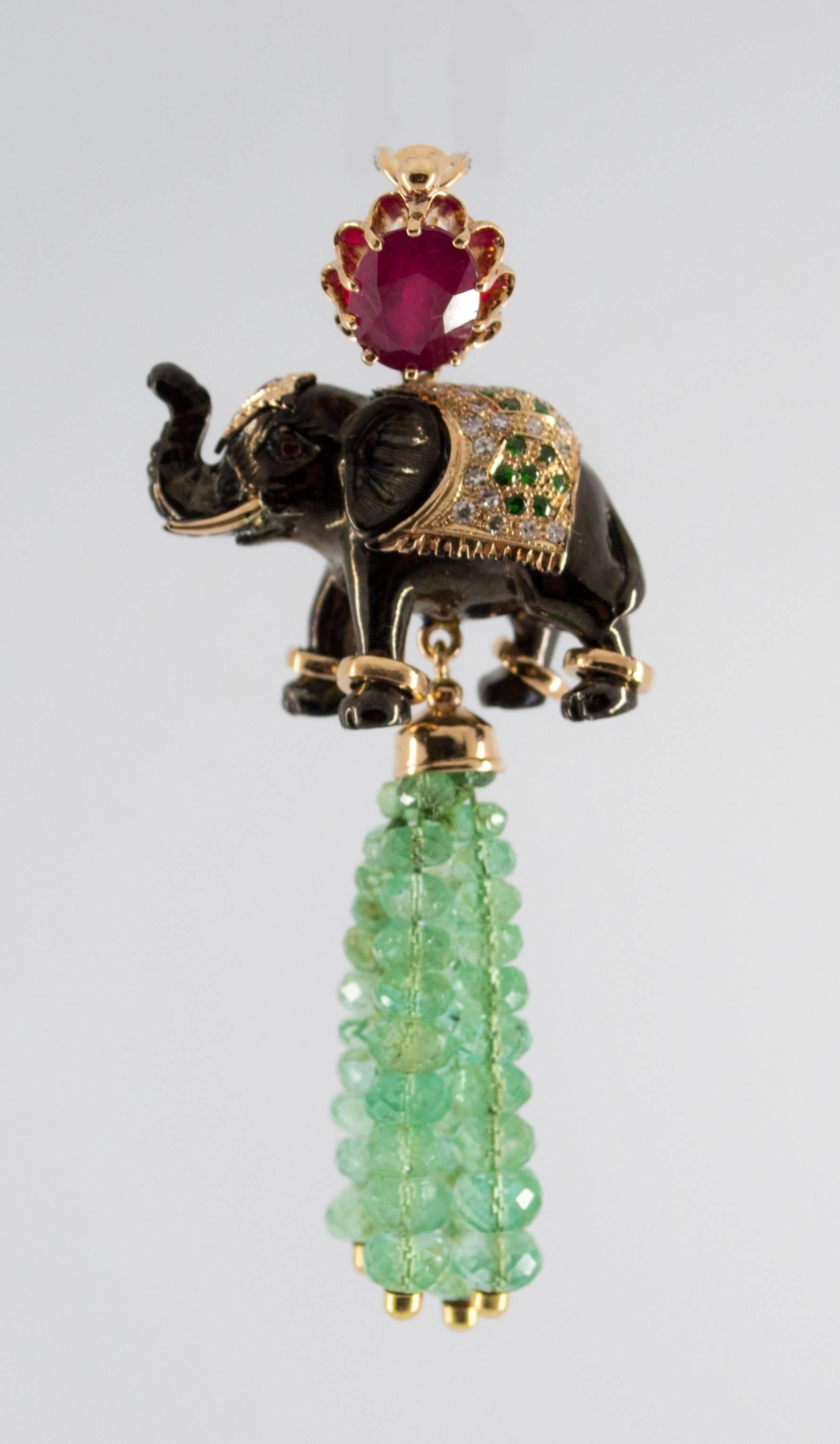 This Elephant Pendant is made of 14K Yellow Gold and Sterling Silver.
This Pendant has 19.90 Carats of Emeralds.
This Pendant has 3.10 Carats of Rubies.
This Pendant has 0.30 Carats of Tsavorite.
This Pendant has 0.35 Carats of Diamonds.
We're a
