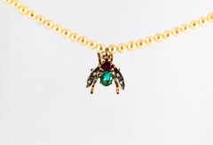 1.38 Carat Diamond Ruby Emerald Pearl Yellow Gold Fly Pendant Beaded Necklace