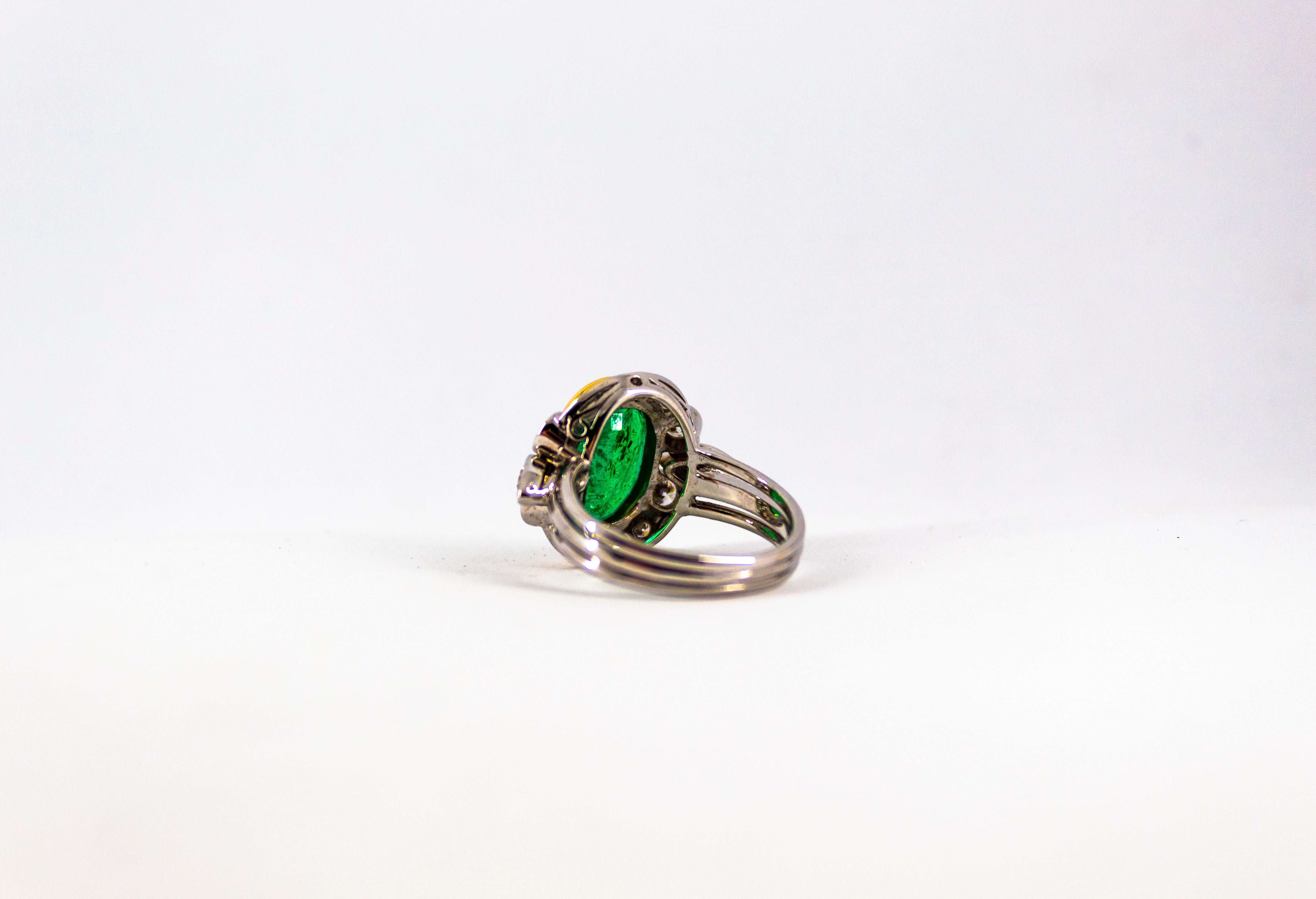 Art Deco 3.48 Carat Emerald 1.10 Carat White Diamond White Gold Cocktail Ring 10