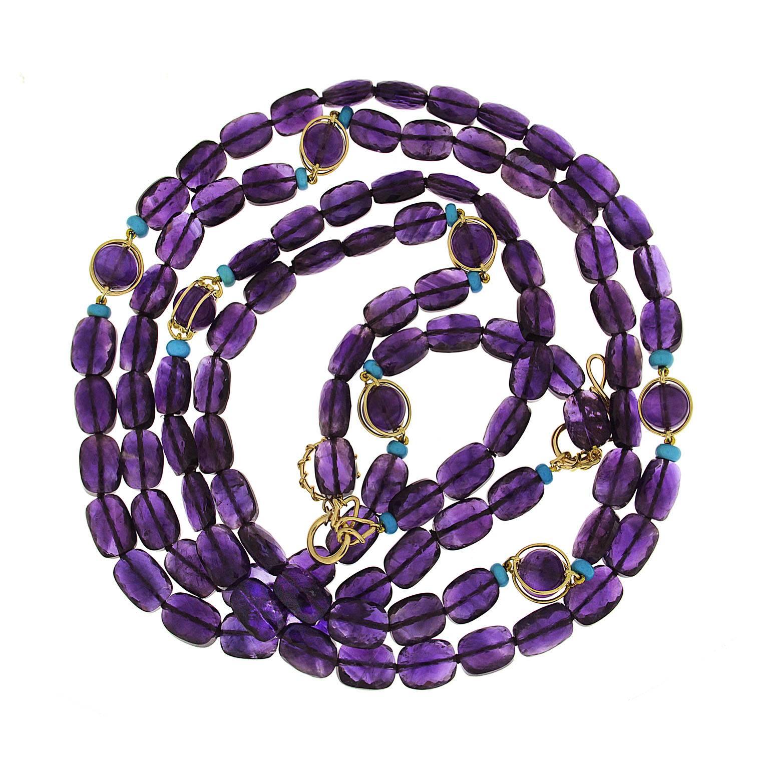 This unique necklace features two strands of Amethyst elongated beads with Doppio Amethyst Ball stations and Turquoise rondelles with medium wire knot and toggle in 18kt yellow gold. The length is 37 inches.