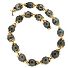 Tahitian pearl necklace with gold leaf motif connectors