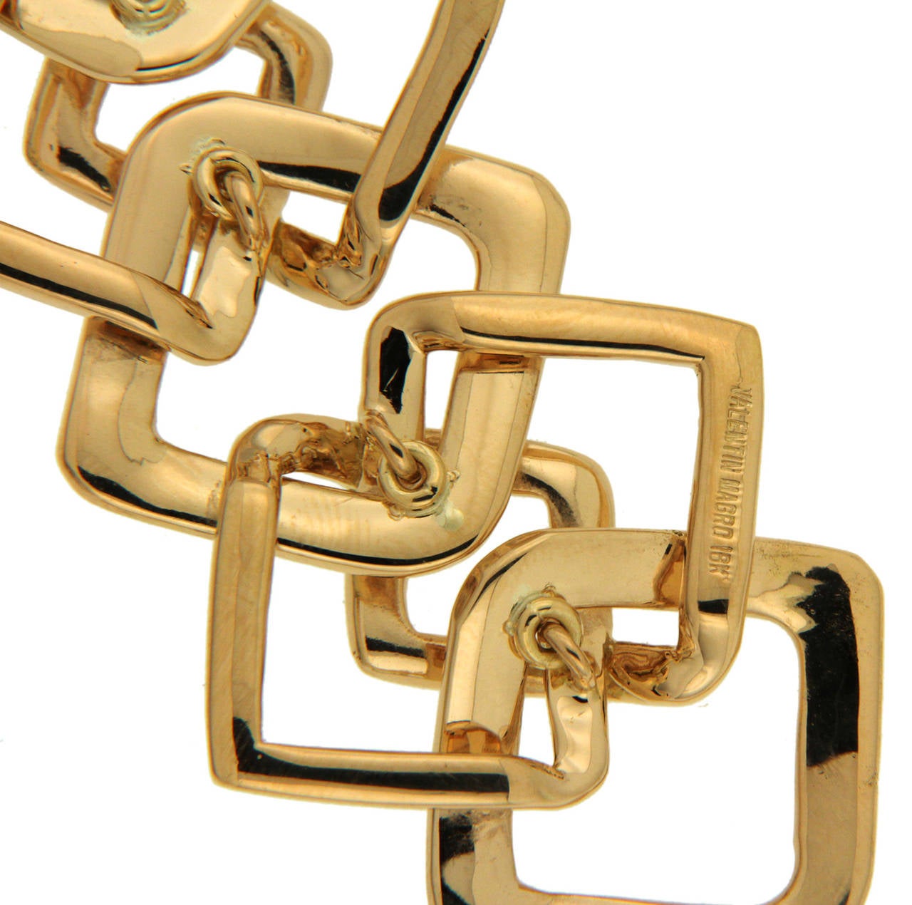 This Gorgeous Bracelet is Connected by Square Links in different sizes made in 18K Yellow Gold.