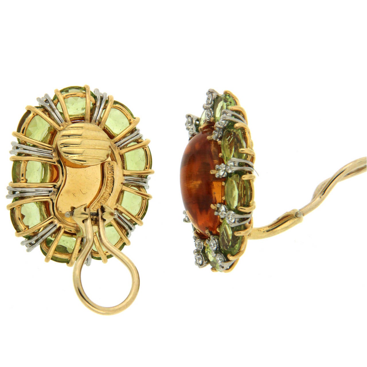 Colori Kidney Earrings with a smooth bean shape Madeira Citrine center and oval peridot surrounding stones with small round brilliant diamond accent in 18kt yellow gold. The earrings are complete with clip backs. 