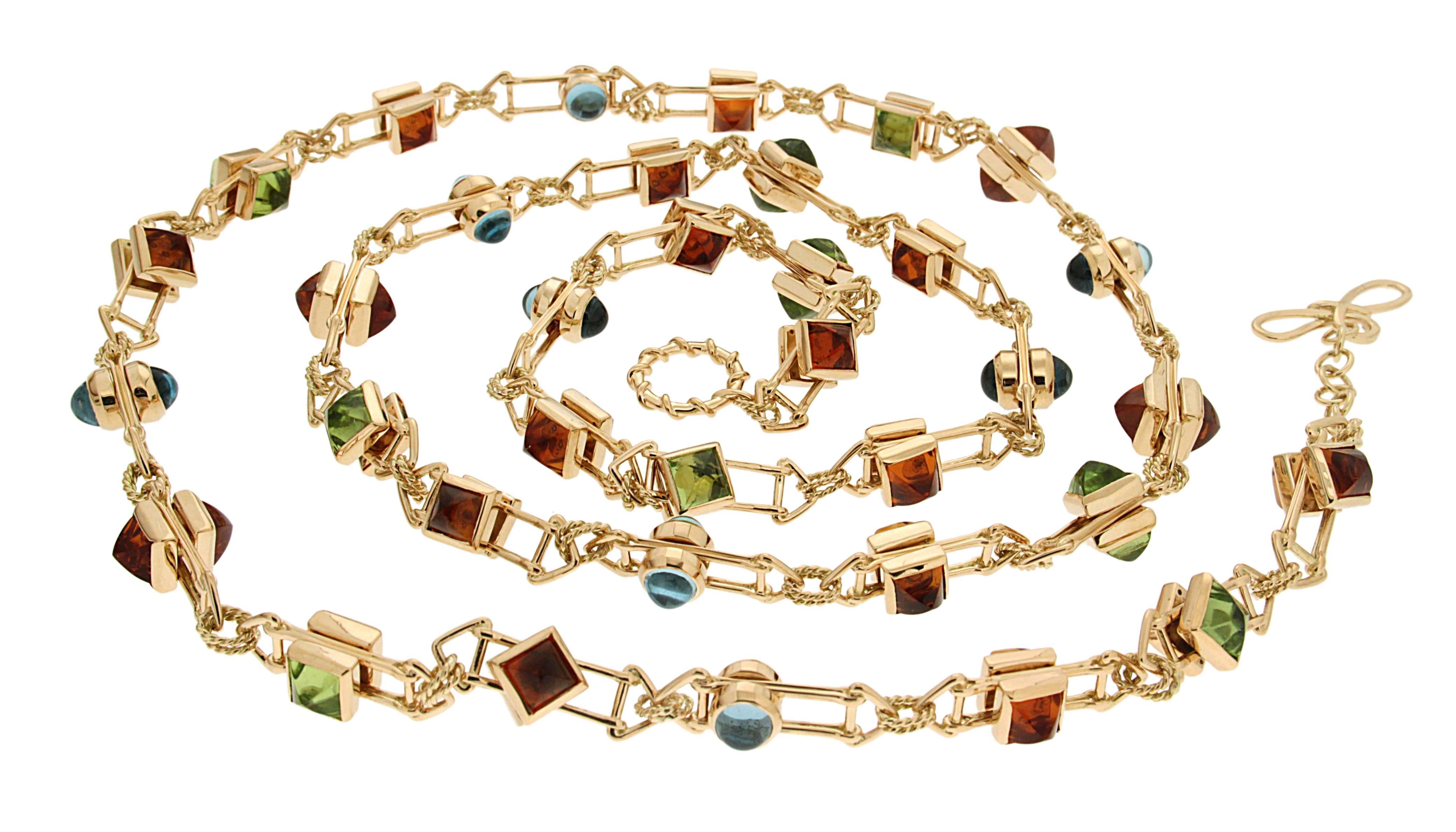 This one of a kind Floating Stone Necklace features special cut squares and rounds of Peridot, Madeira Citrine and Blue Topaz, and is finished in 18kt yellow gold.