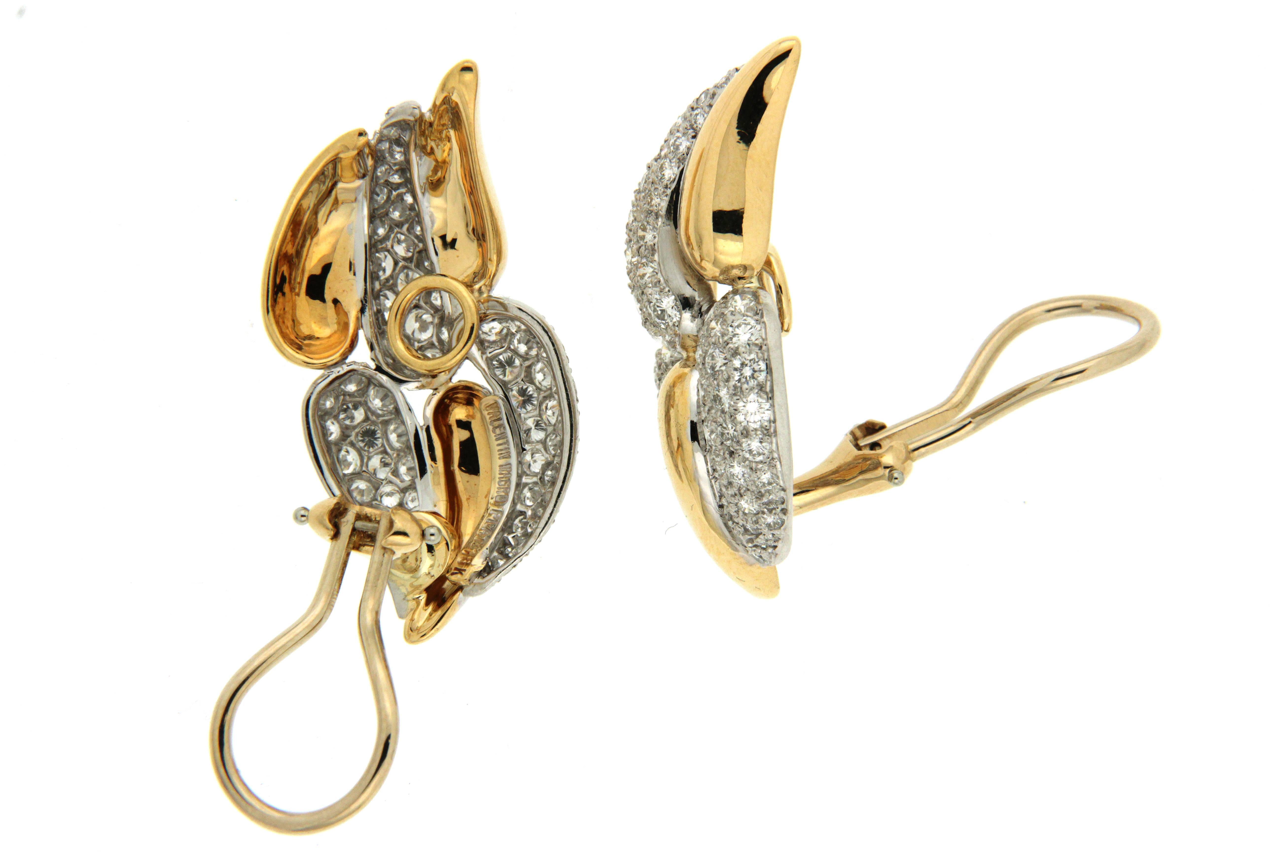 One of the most classic and timeless jewelry designs, inspired by the beauty of flames, this pair of earrings was created with pave diamonds set in 18kt yellow gold and platinum with clip backs, resulting in a perfect marriage of glamour and