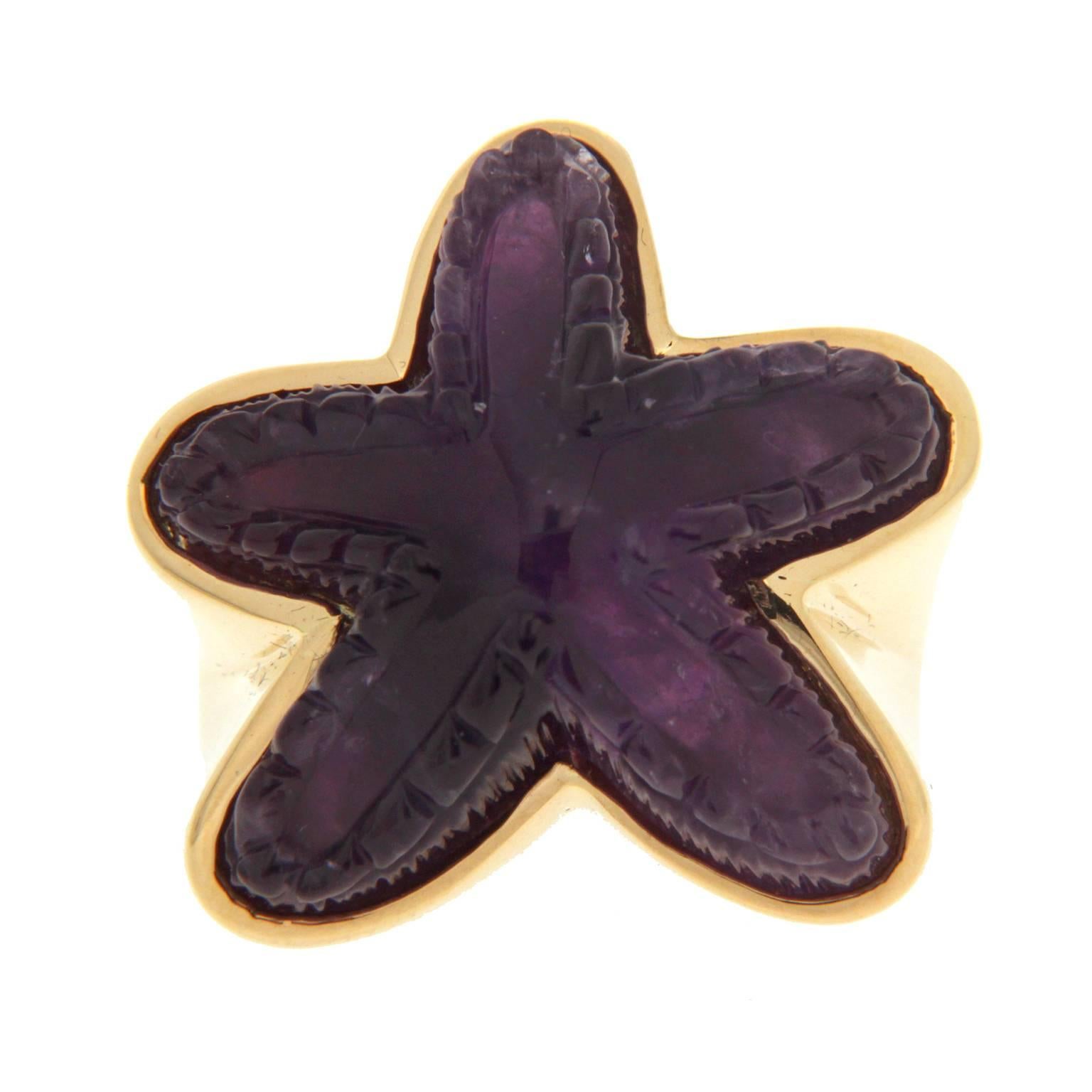 This one of a kind ring is made in 18kt yellow gold, it features a special cut starfish amethyst stone.