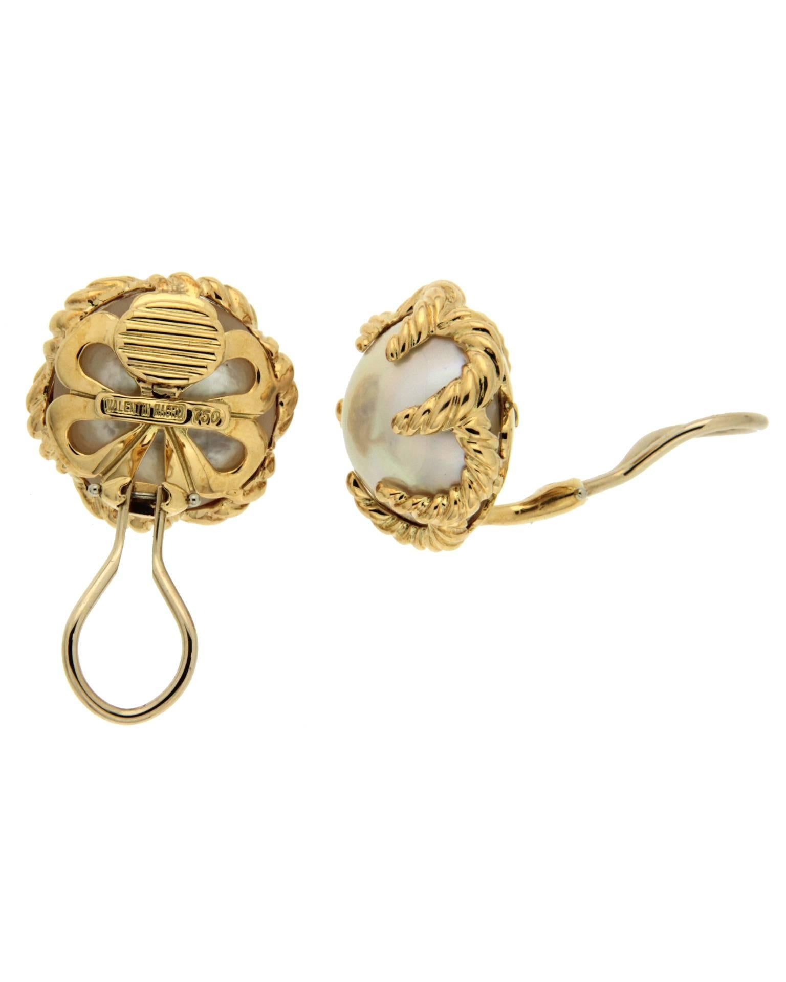 These mabe pearl earrings are made in 18kt yellow gold, with clip backs. Posts can be added upon request.