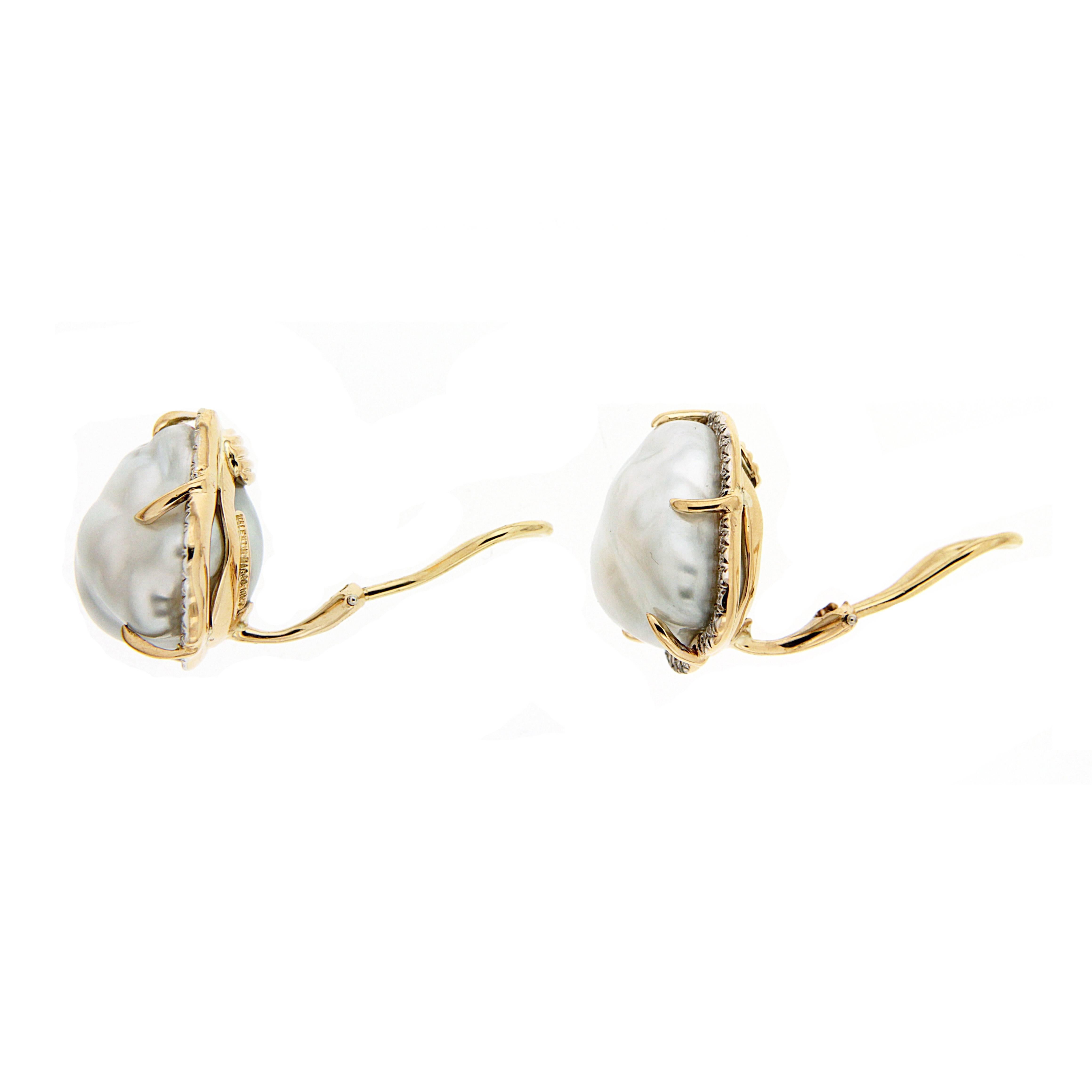This pair of clip-on earrings features Baroque Pearls with Pave Diamonds and gold claws motifs. The earrings are finished in 18kt Yellow Gold. Posts can  be added upon request.