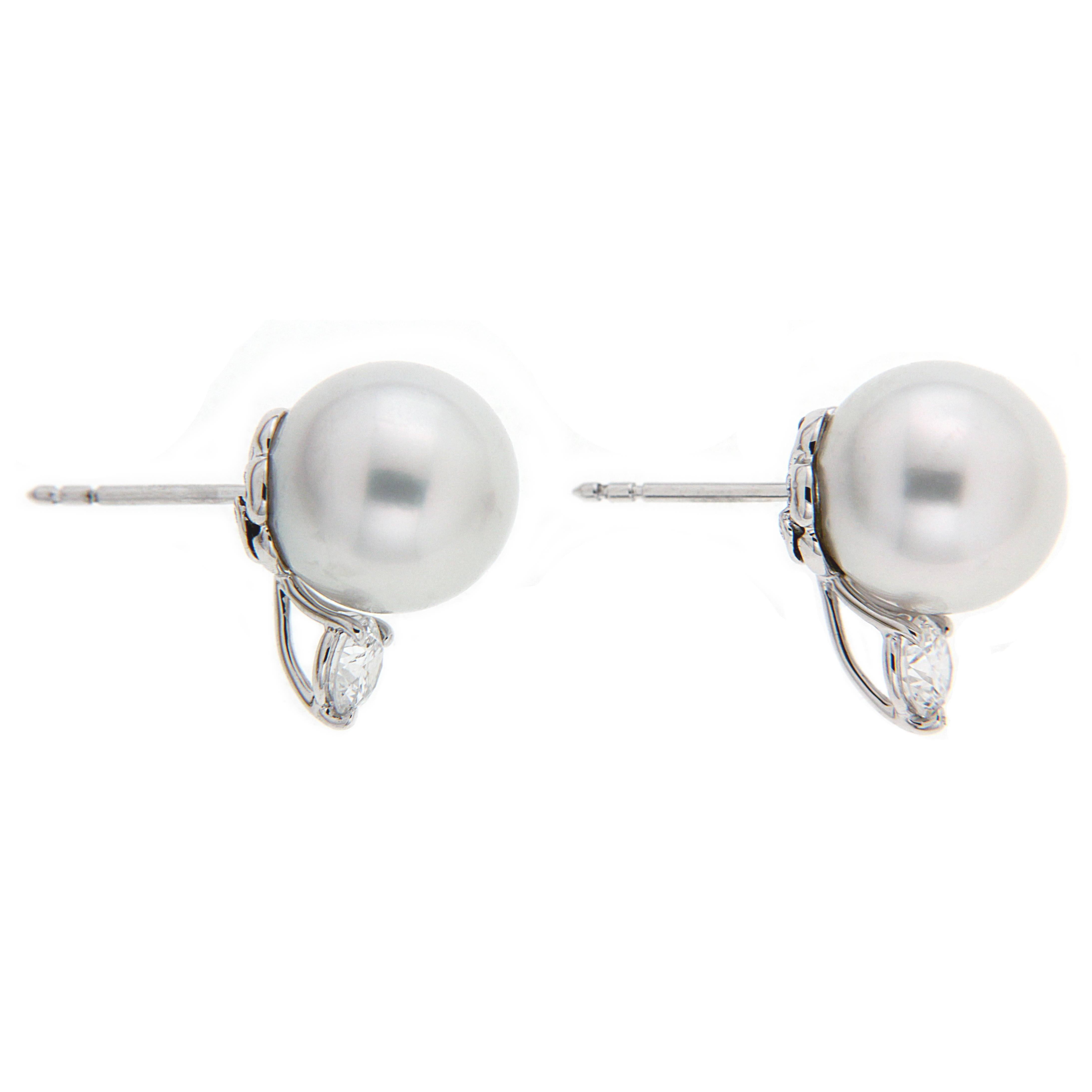 10.6mm South Sea Pearls with 2 Round Diamonds at the bottom Stud earrings with Posts in 18kt White Gold.  Diamond total weight 0.56ctw (DEF VVS quality)