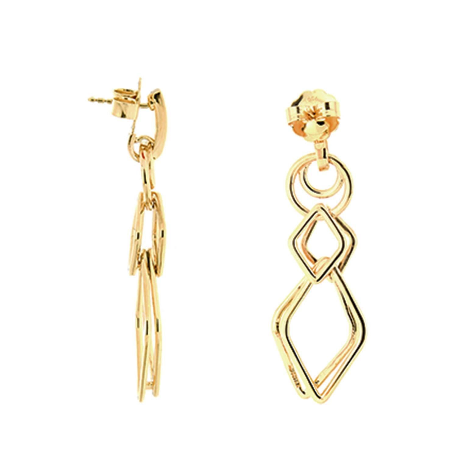 For decades, Valentin Magro's fine jewelry creations have illuminated the most special of occasions. This lovely pair of earrings features different geometric forms of round and elongated quadrilateral links interlocking each other in 18kt yellow