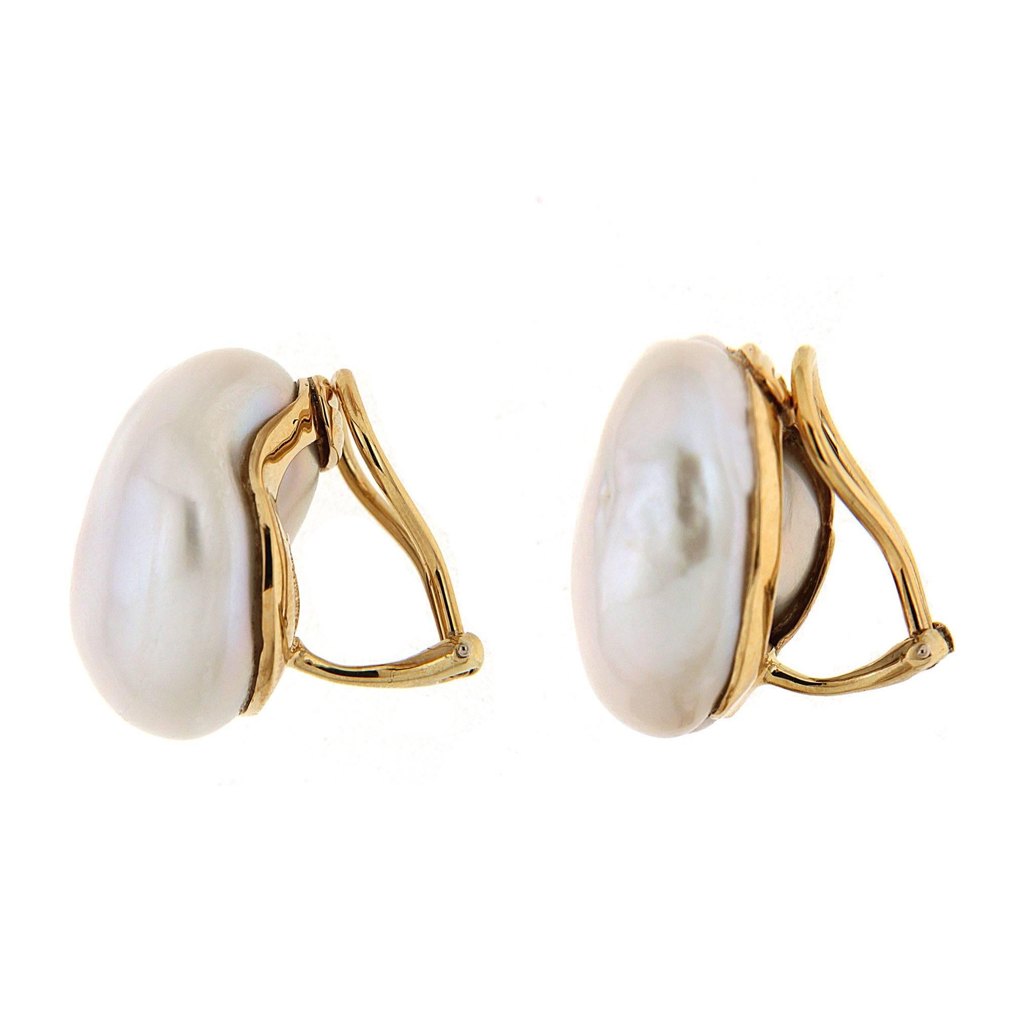 This pair of lovely Freshwater Baroque Pearl Earrings is finished in 18kt yellow gold with clip backs. (posts can be added on upon request).