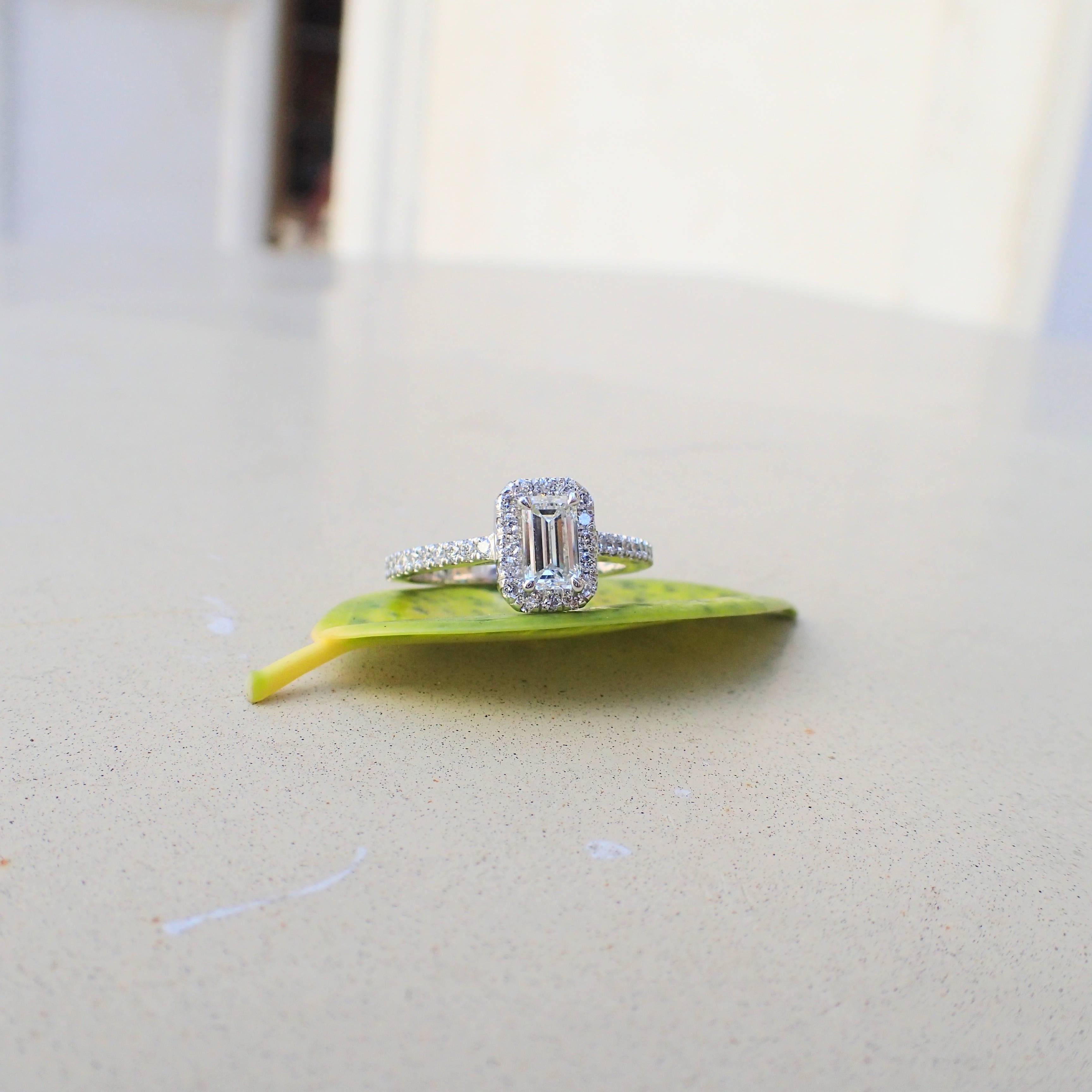 Contemporary 0.98 Carat - Platinum - Emerald Cut Diamond Engagement Halo Ring