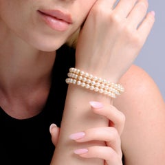 Bracciale vintage a tre fili con perle coltivate e chiusura in oro 14k