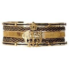 Important bracelet manchette éthiopien en or jaune de 20 carats, orné d'un blason, datant des années 1960, JFK