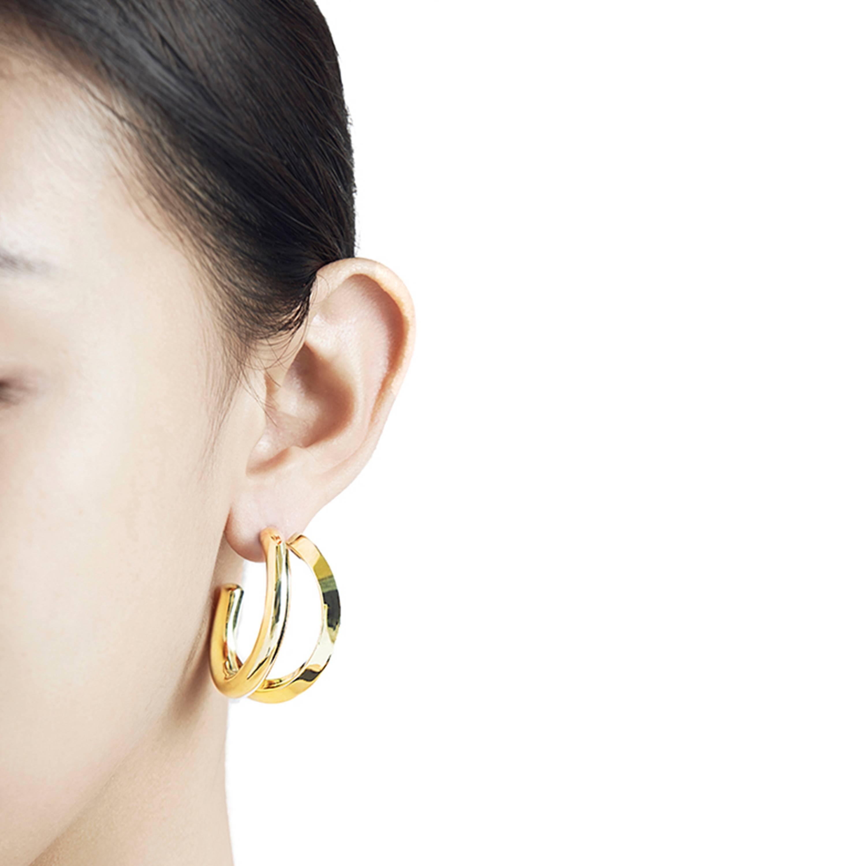 The 'Fusion Earrings, by Mistova, are from the NOVA 01 collection which explores the transition from square to round. They are easy to wear alternative to the regular hoops. Made from 18K gold.