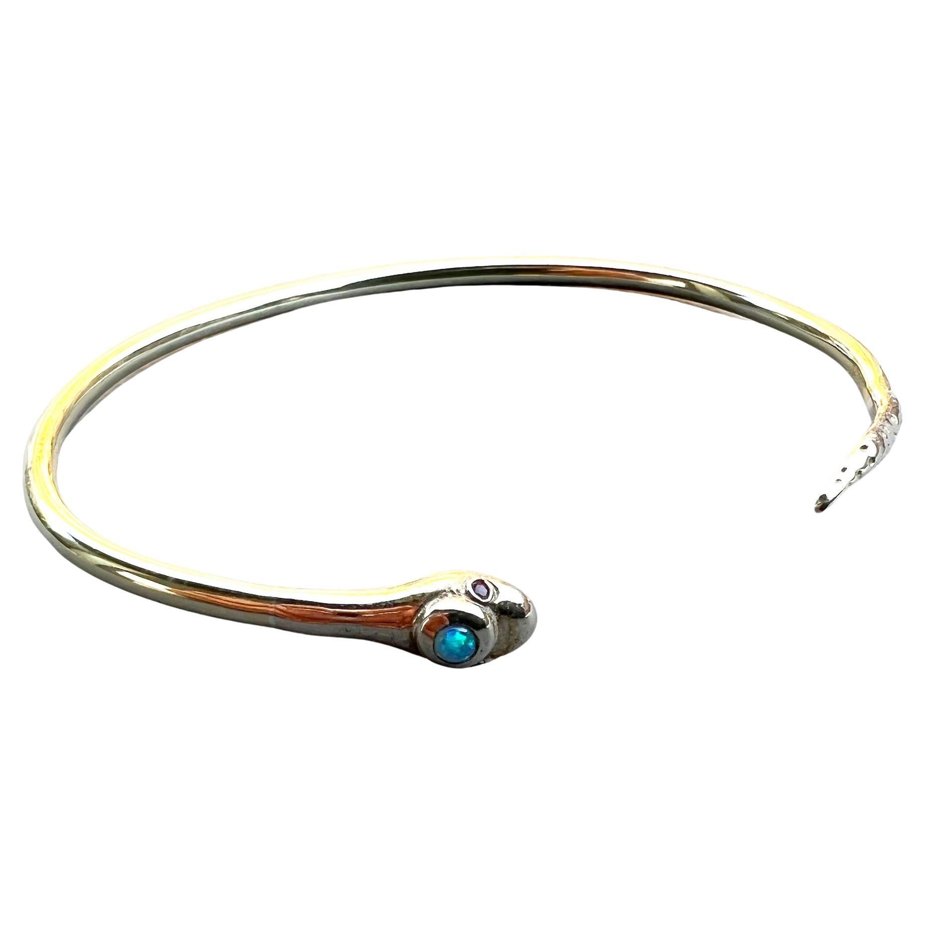 J Dauphin Bracelet manchette jonc serpent en opale, rubis et bronze en vente
