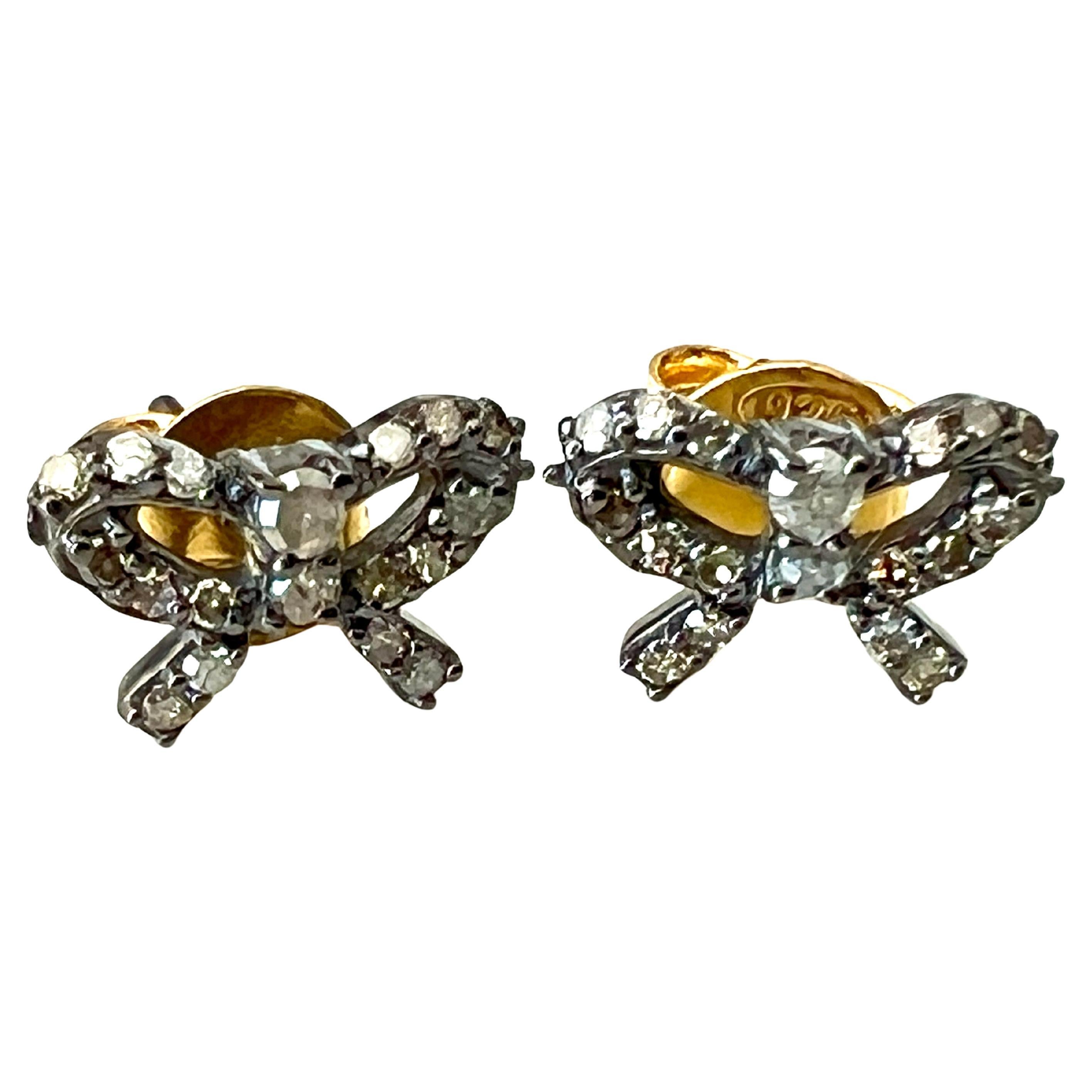White Diamond Bow Stud Earring Victorian Style Raw Diamonds

Material: Antique 18 k Gold Plated Silver

Designer: J Dauphin

These bow earring are made of multiple diamonds, which are associated with clarity, purity and spiritual enlightenment.