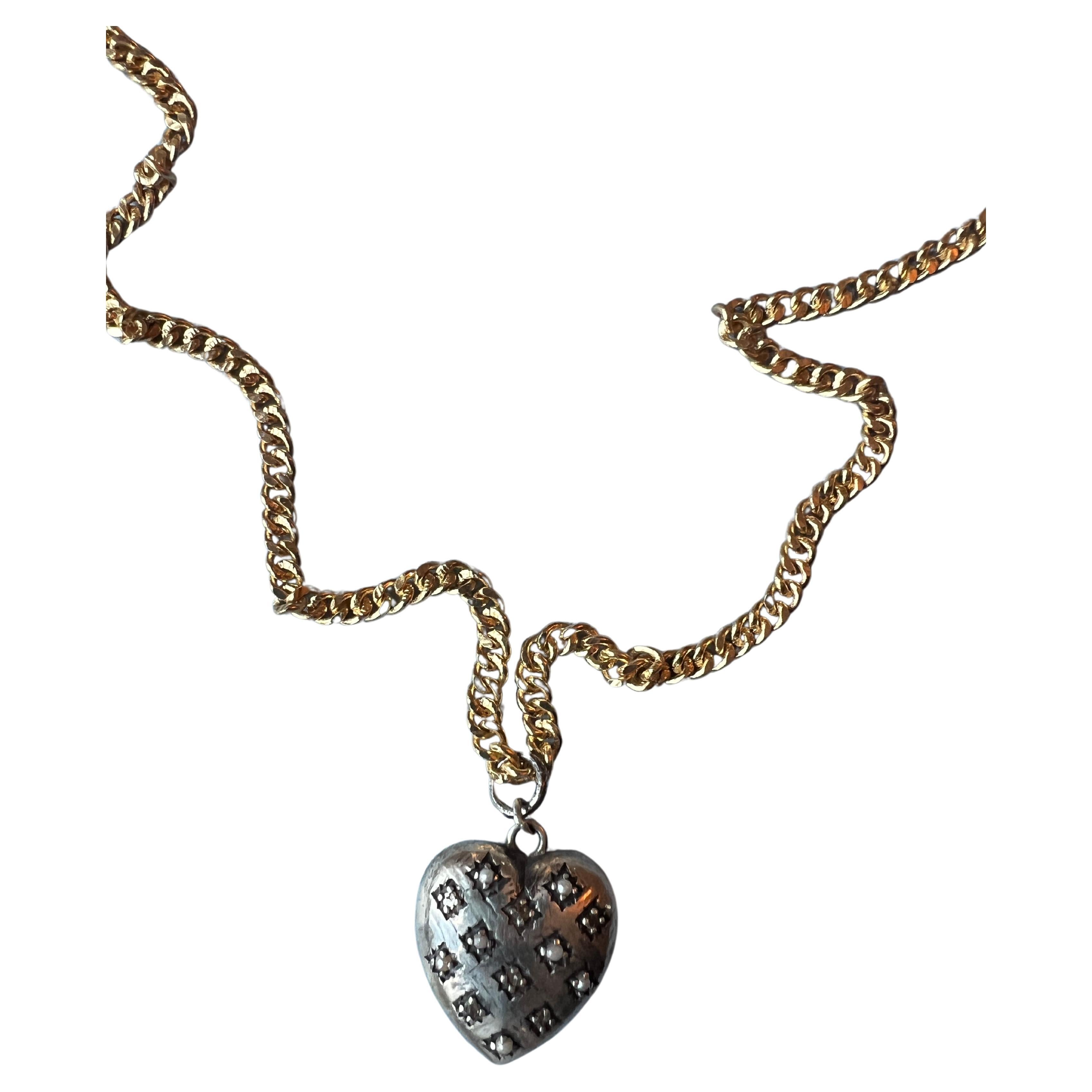 Silver Heart Long Necklace White Diamond White Pearl

Chain: Gold plated Brass
Heart: Solid Silver

Designer: J DAUPHIN

Length: 28 inches 

White diamonds hold significant spiritual meaning by embodying purity, clarity, and enlightenment. They are