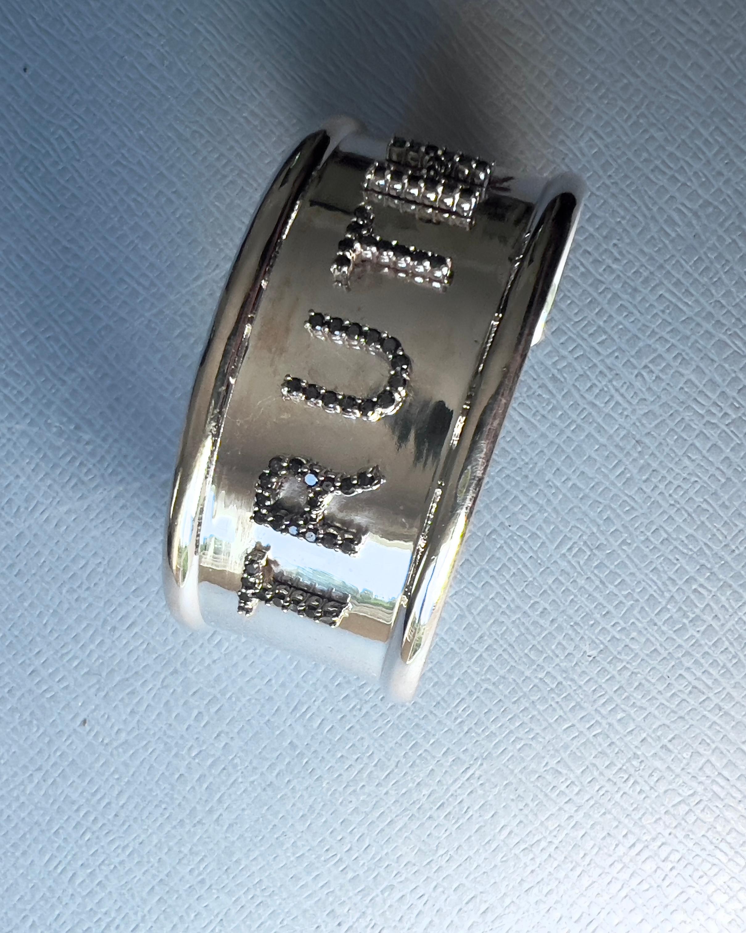 Sterling Silver “TRUTH” Cuff Bangle with Black Diamonds – Kabbalistic and Universal Spiritual Jewelry

This custom-made cuff bangle is crafted in solid sterling silver and features the word “TRUTH”, with each letter meticulously set in natural black