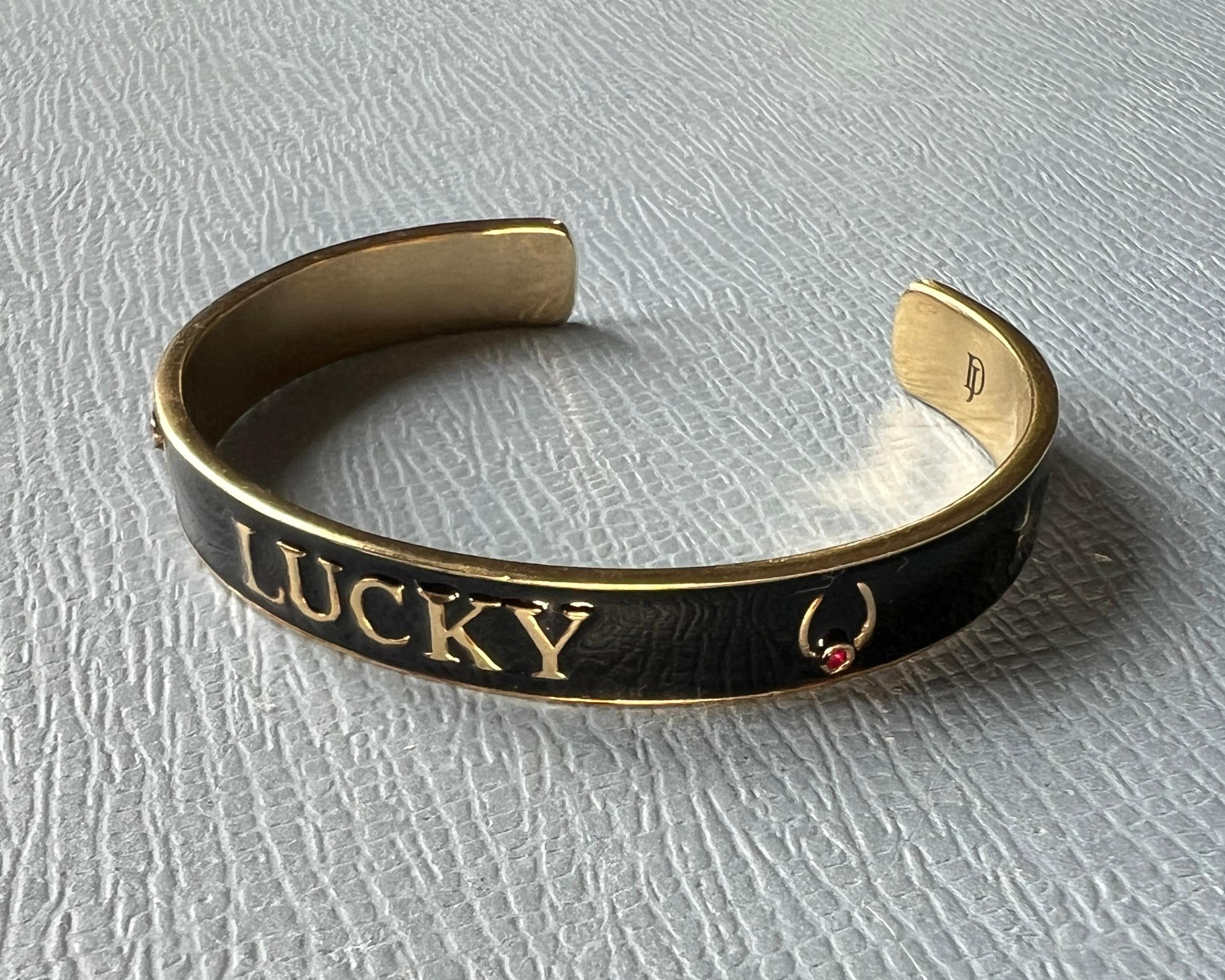Brilliant Cut Ruby Lucky Horseshoe Cuff Bracelet Black Enamel For Sale