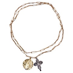 Collana con medaglia miracolosa, catena a maglie a forma di graffetta, croce greca, tanzanite e rubino