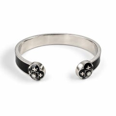 Bracciale a polsino in smalto nero, argento, diamanti, giglio francese e iscrizione “Infinito”